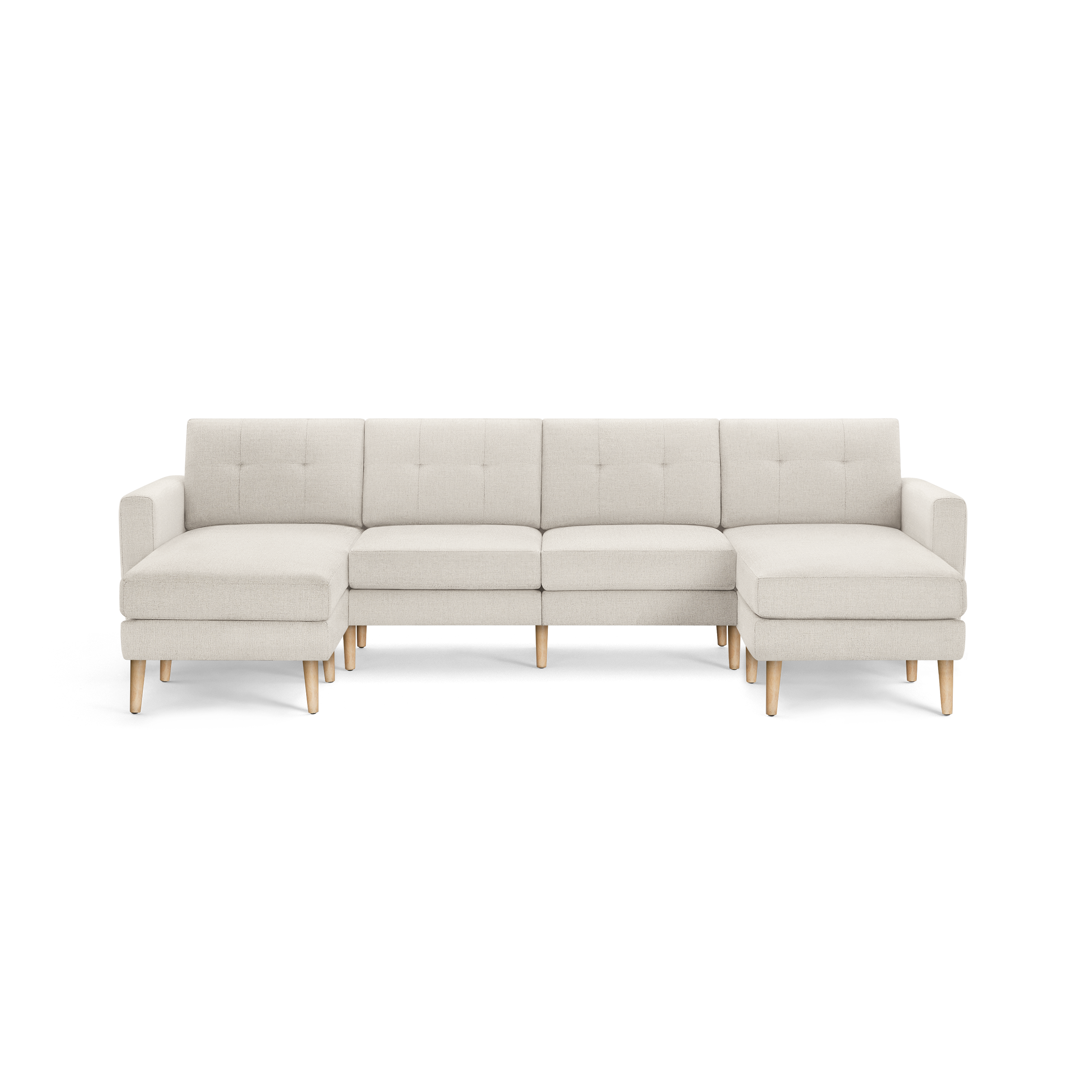 Modern beige sectional sofa with tufted back cushions, wooden legs, and two chaise lounges on either end.