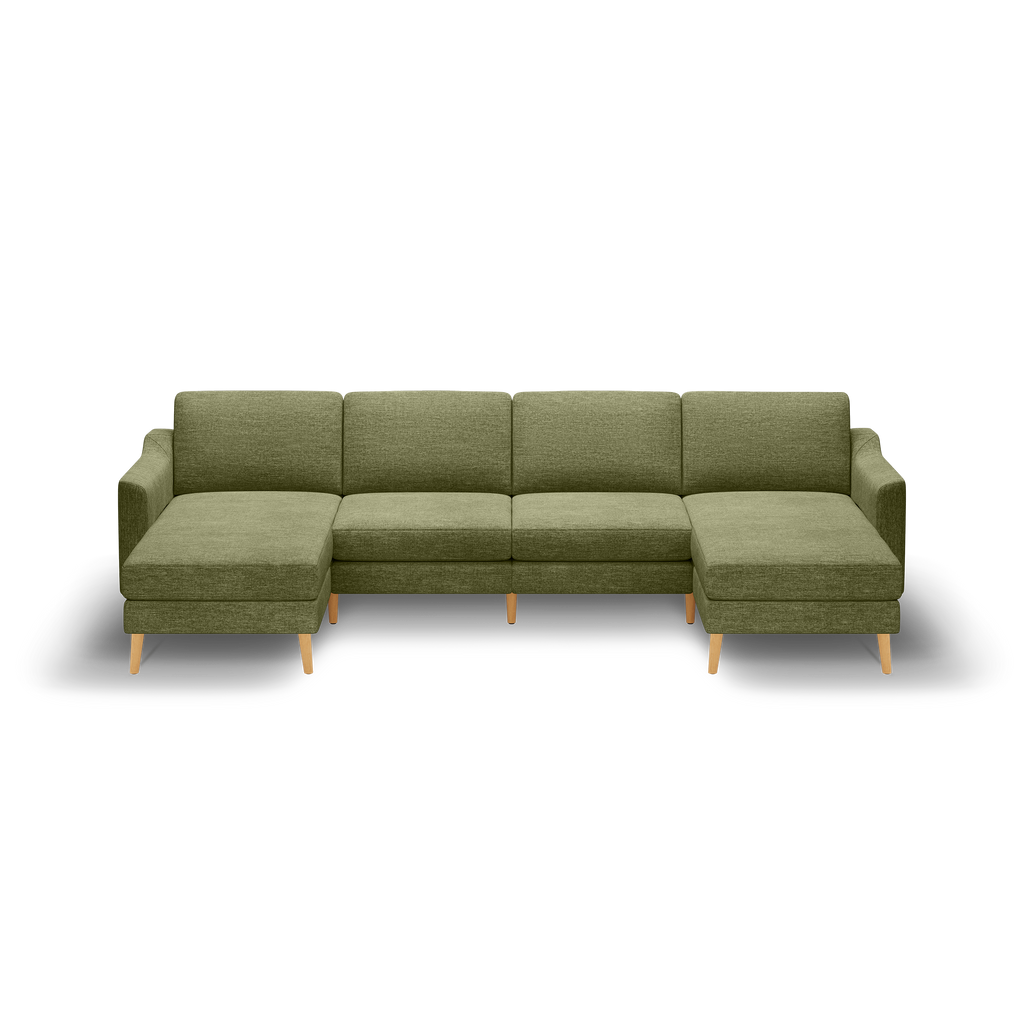 Olive green fabric sectional sofa with left and right chaise lounges, wooden legs, and clean modern design against black background.