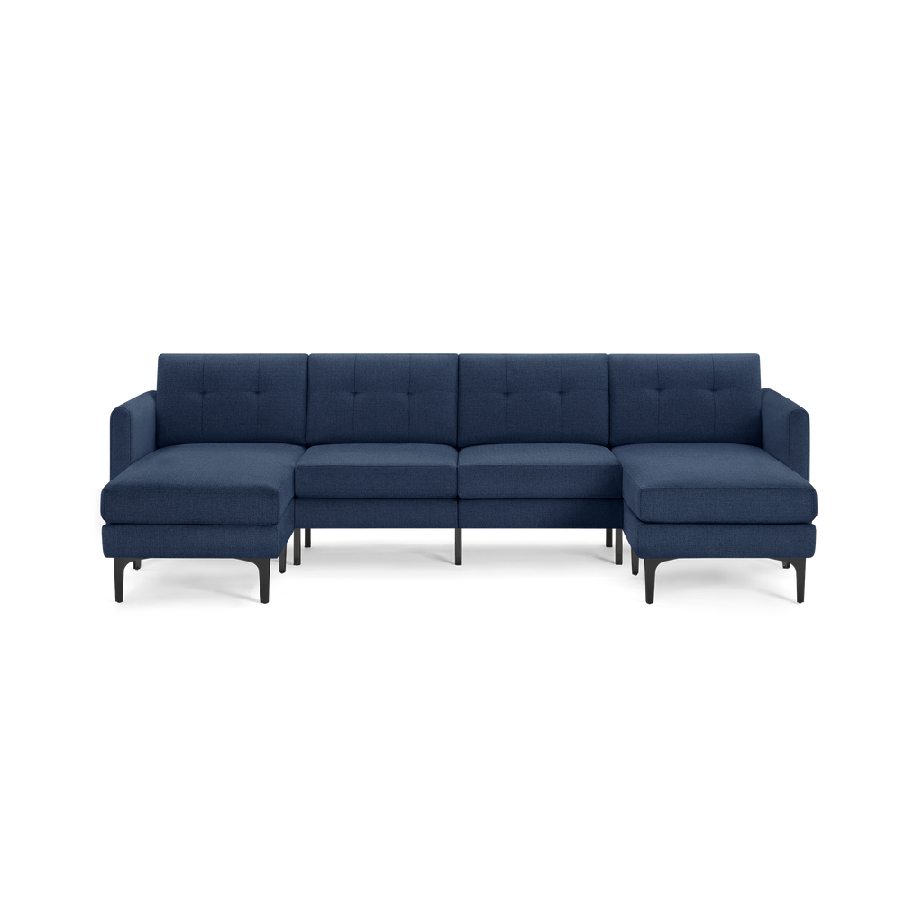 Modern navy blue fabric sectional sofa with button-tufted back cushions, low arms, and black metal legs, designed for spacious seating.