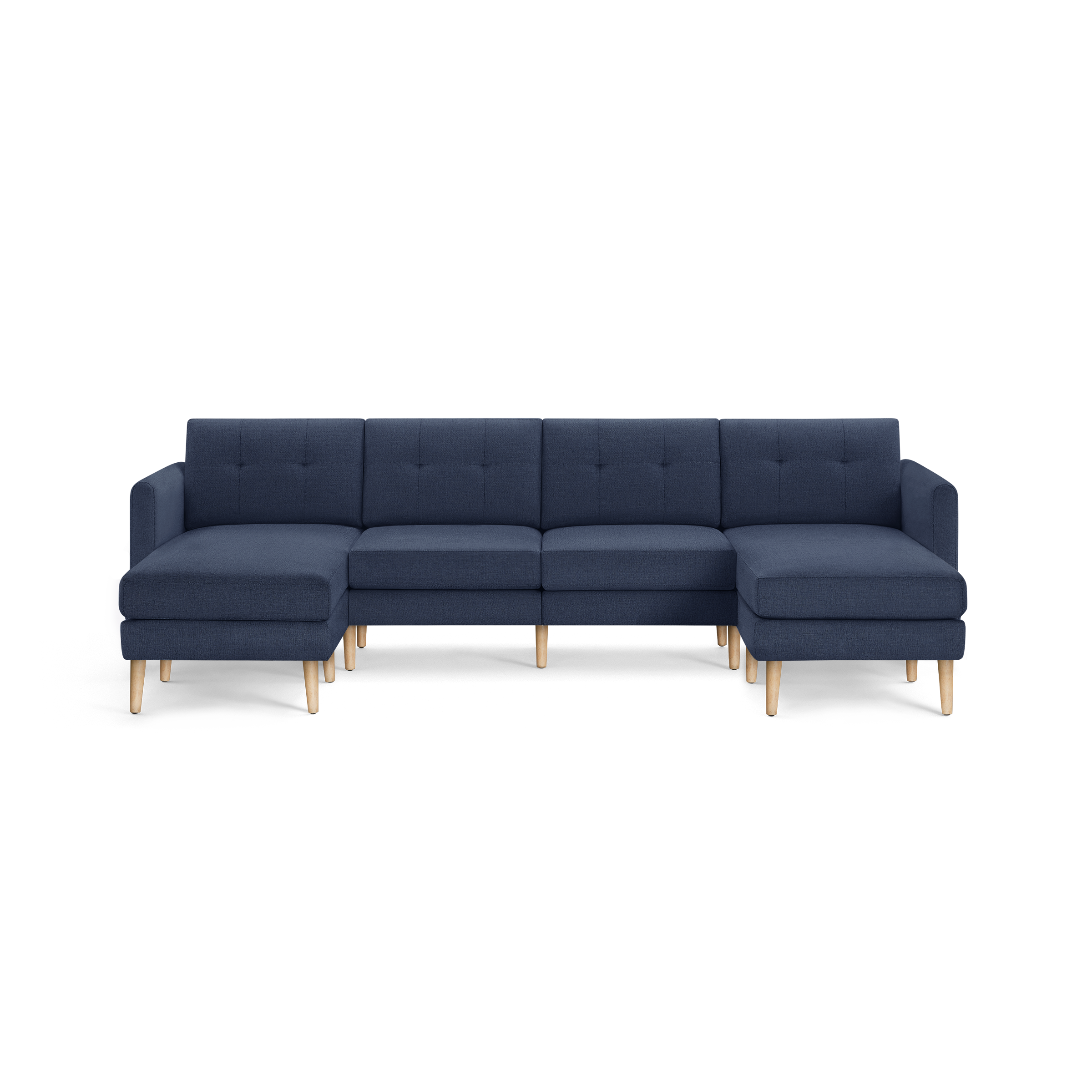 Large modern navy blue sectional sofa with tufted back cushions and light wooden legs, featuring left and right chaise lounges.