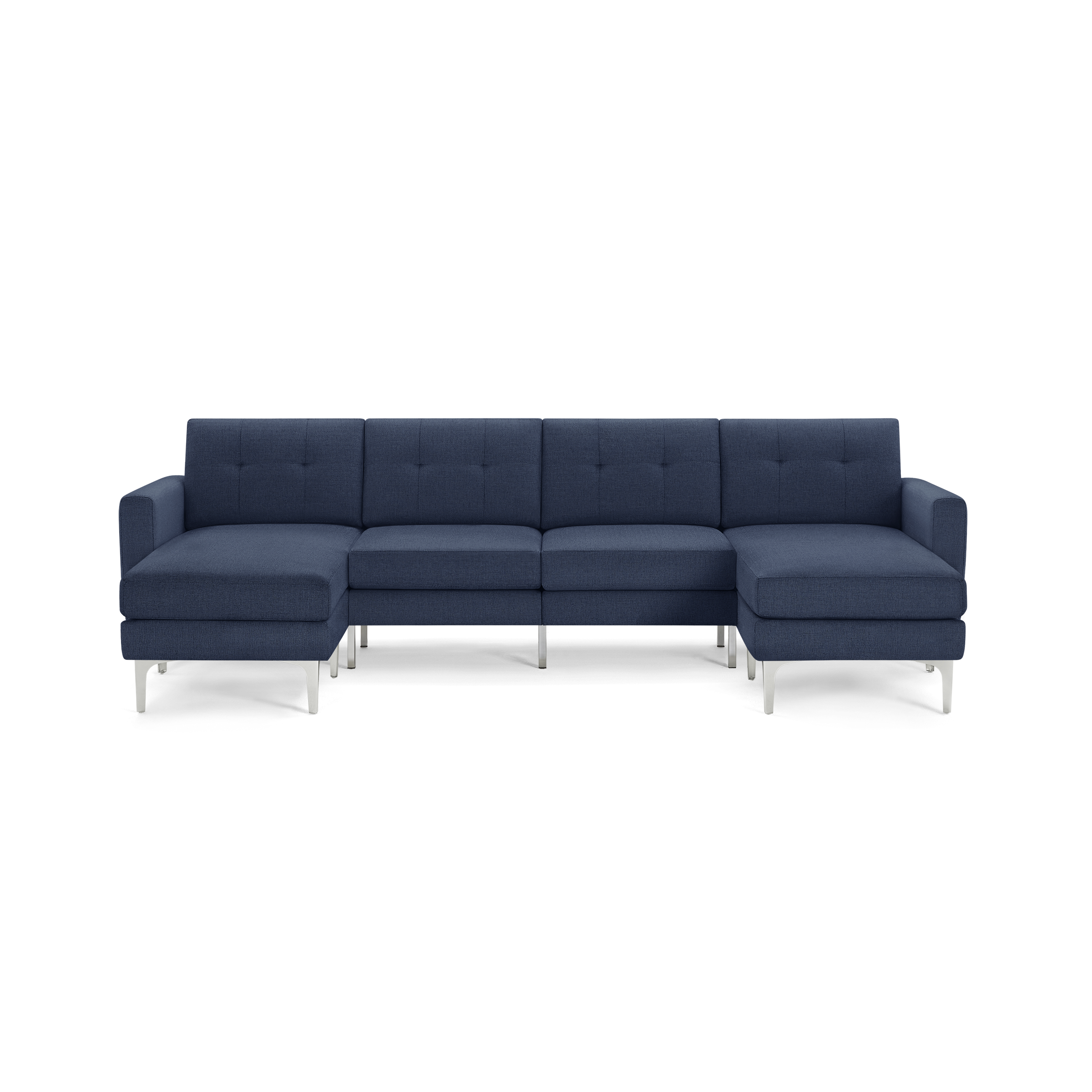 Modern U-shaped sectional sofa in dark blue fabric with tufted back cushions and sleek silver metal legs.