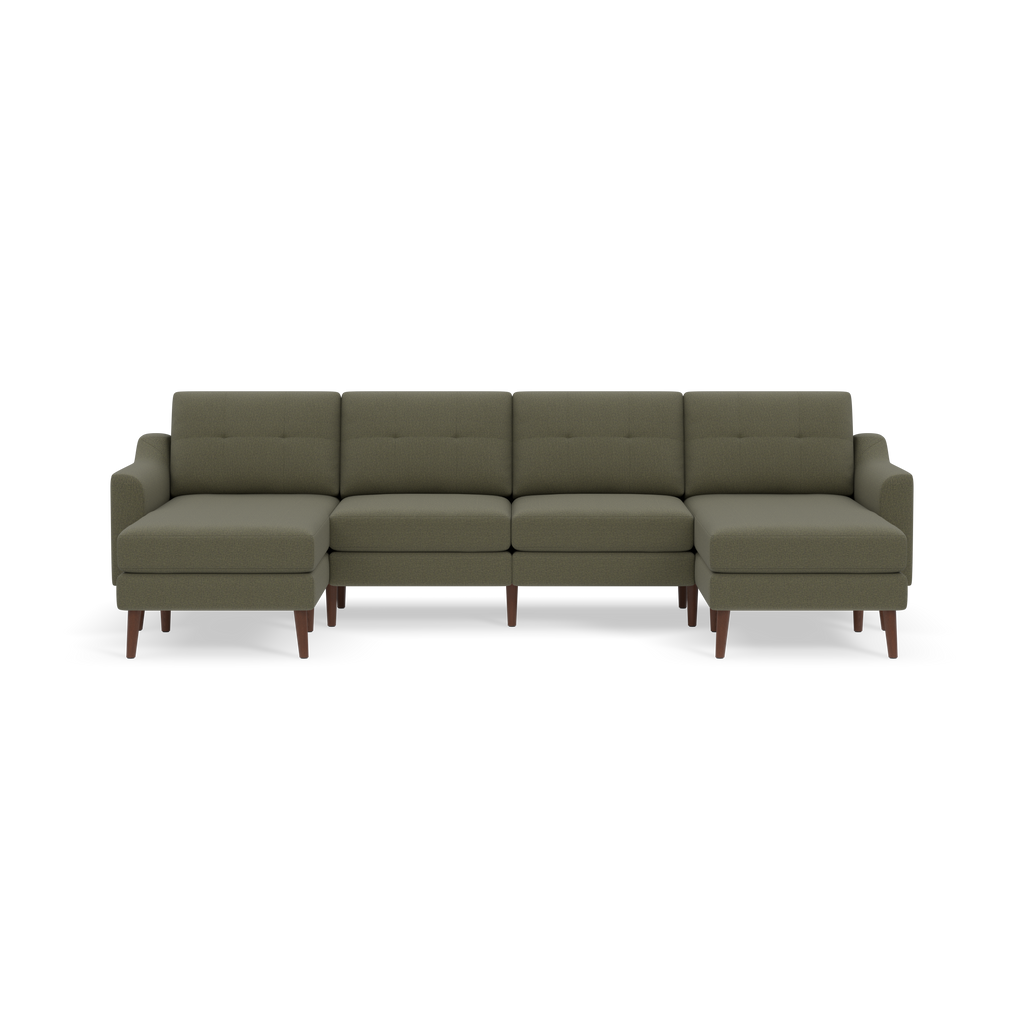 Large Moss green sectional sofa with wooden legs, tufted back cushions, and chaise lounges on both ends against black background.