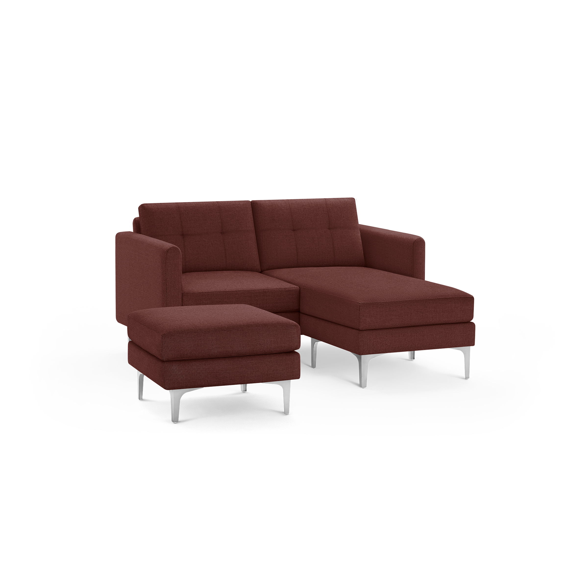 Modern dark red upholstered sectional sofa with tufted back cushions and separate matching ottoman, supported by slim silver metal legs.