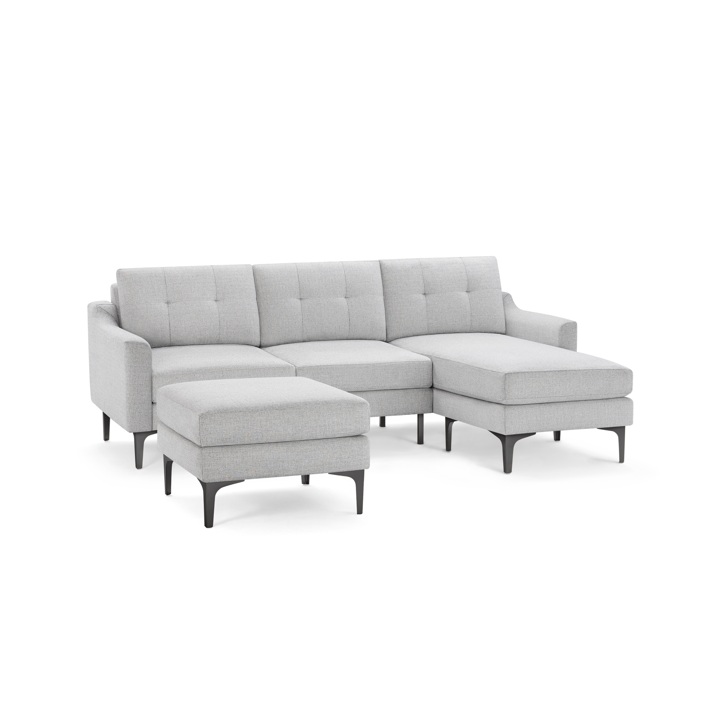 Modern light gray sectional sofa with tufted back cushions, metal legs, and a matching square ottoman.