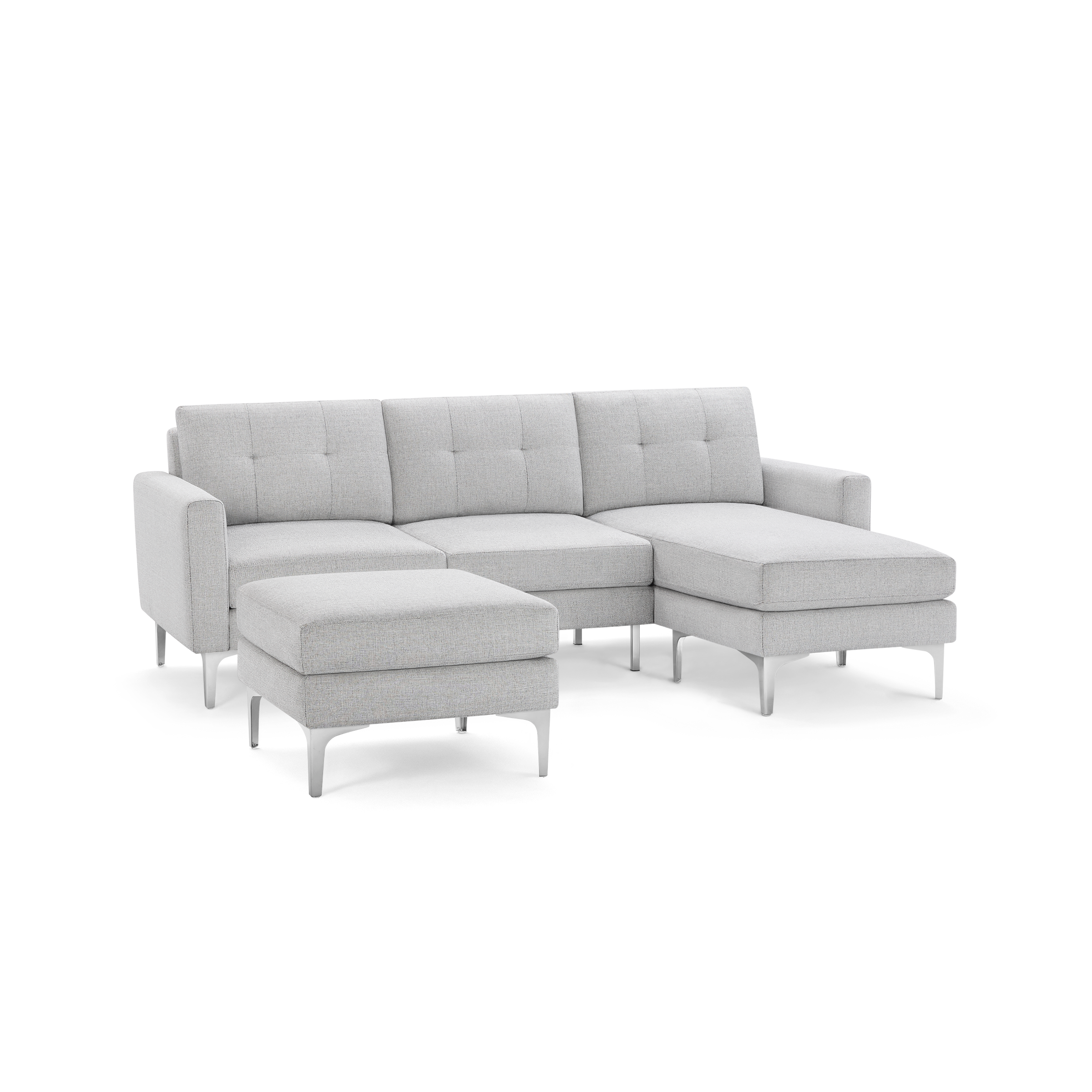 Light gray modern sectional sofa with tufted cushions, metal legs, right chaise, and matching ottoman.