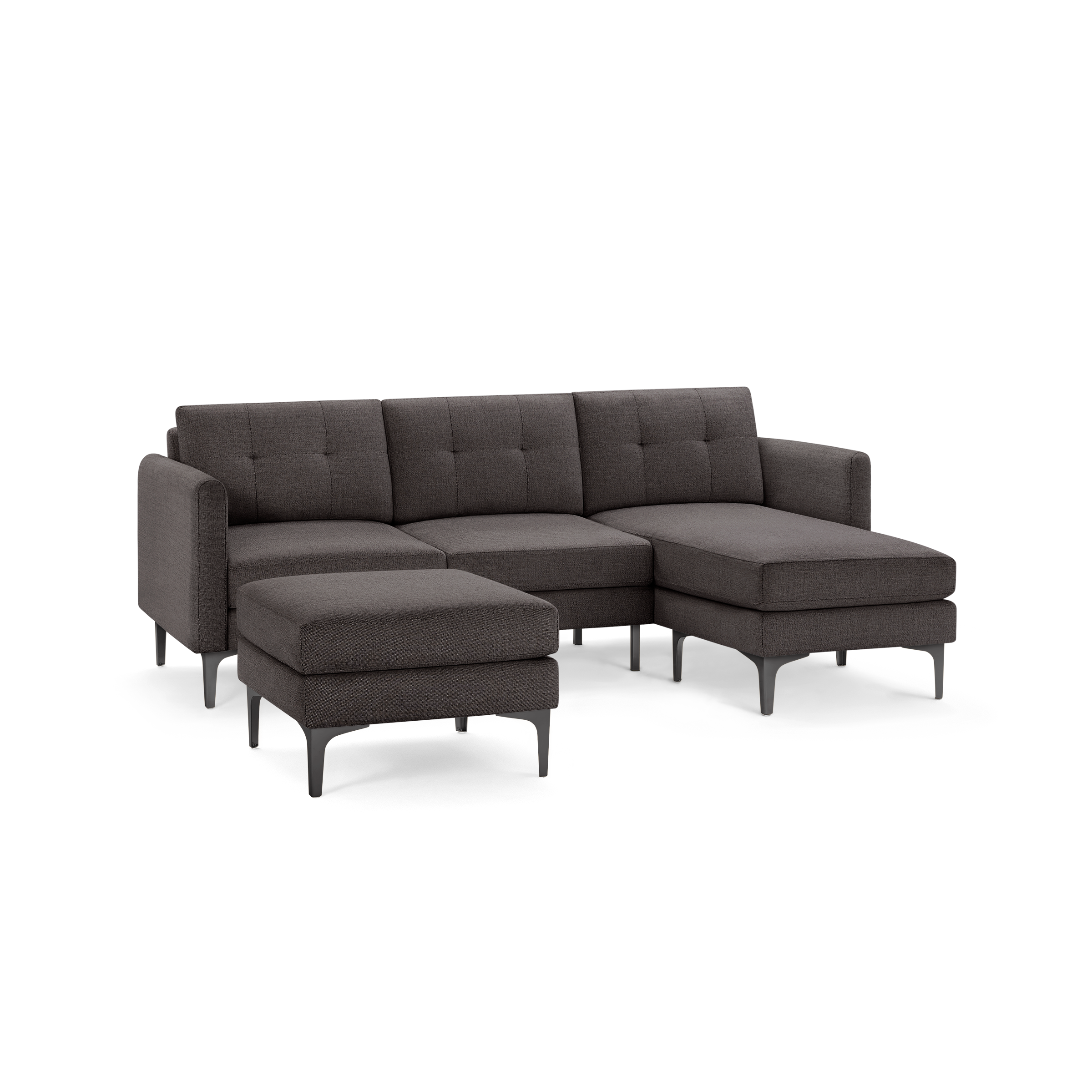 Dark gray fabric sectional sofa with an attached chaise lounge and a separate ottoman, supported by black metal legs.
