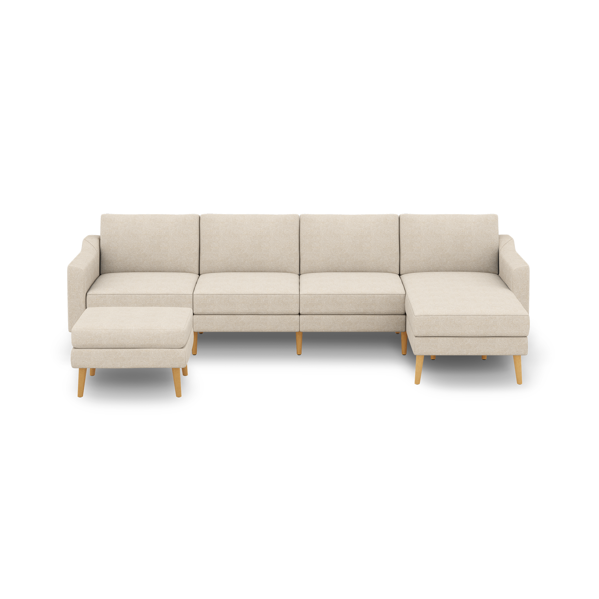 Beige fabric sectional sofa with wooden legs, featuring a chaise on the right and a matching ottoman on the left.
