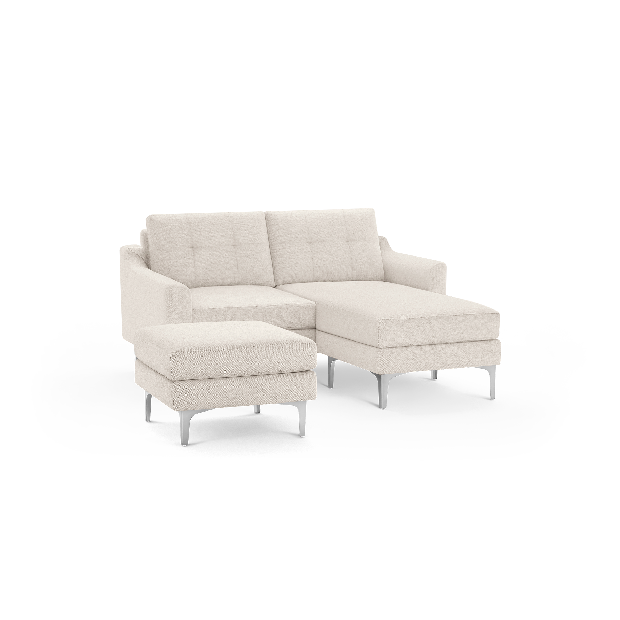 Beige upholstered modern sectional sofa with metal legs, tufted back cushions, and matching ottoman.
