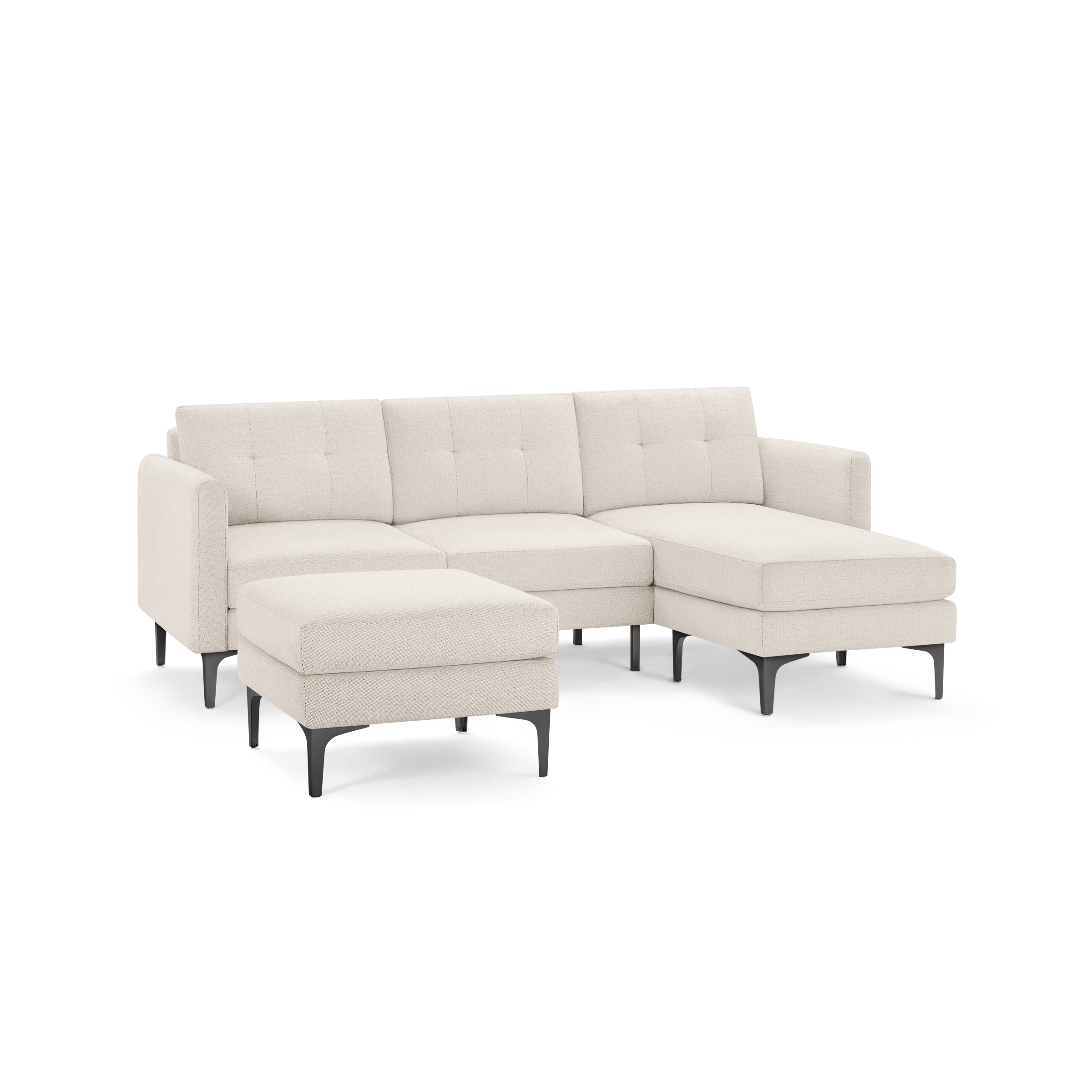 Modern beige sectional sofa with tufted backrests, metal legs, and matching ottoman for versatile seating arrangements.