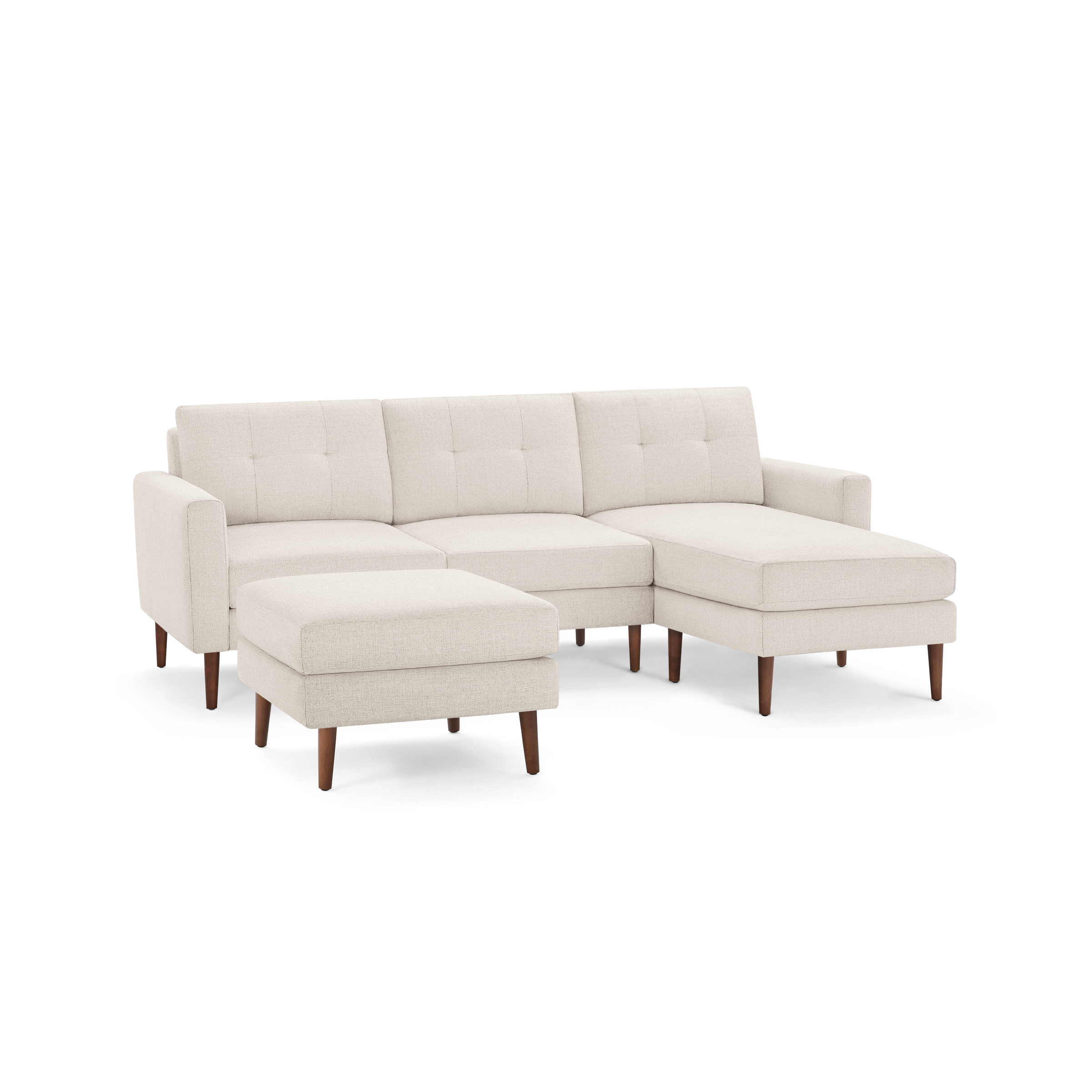 Beige modern sectional sofa with tufted back cushions, wooden legs, and matching ottoman, offering ample seating and comfort.