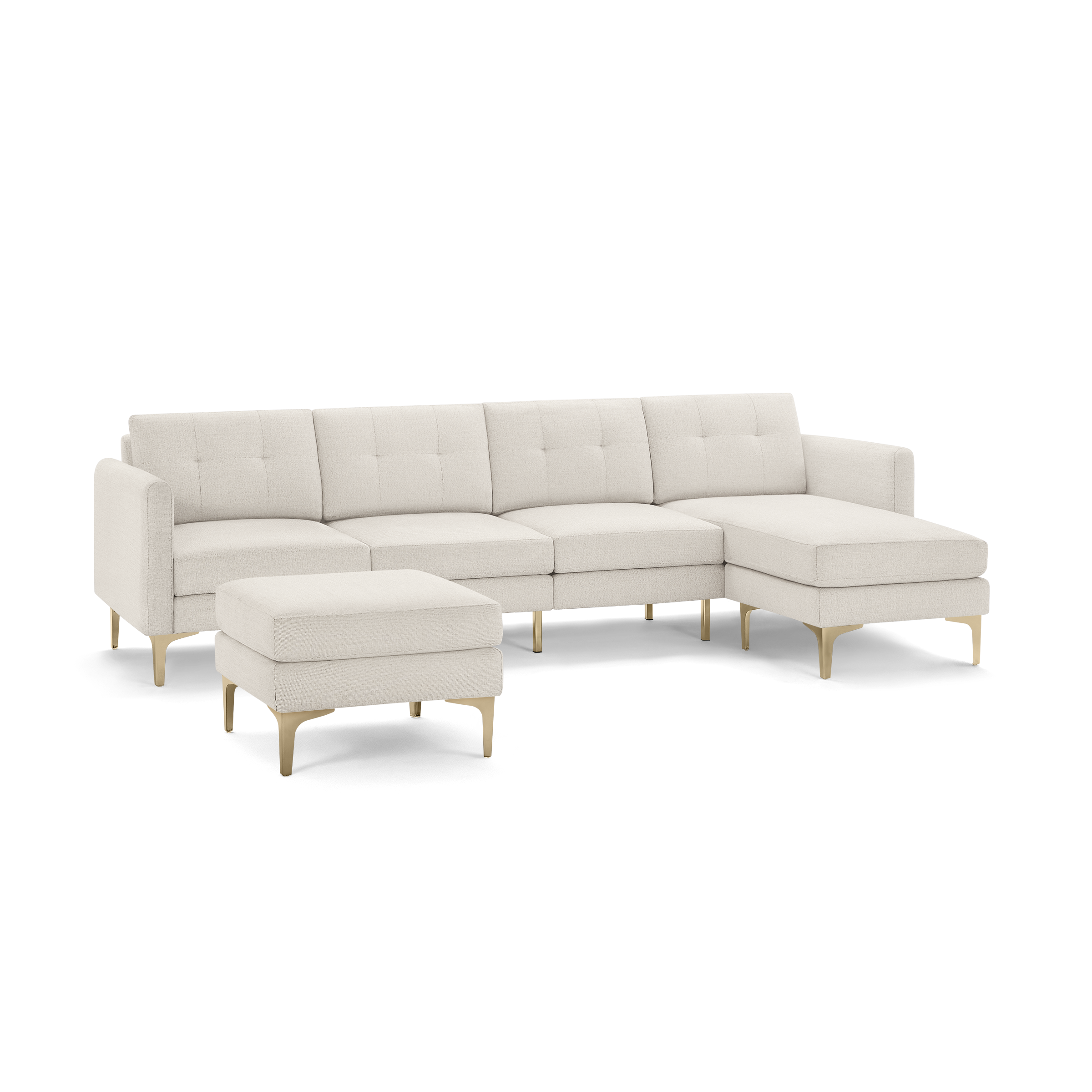 Modern beige sectional sofa with chaise lounge and matching ottoman, featuring tufted cushions and gold metal legs.