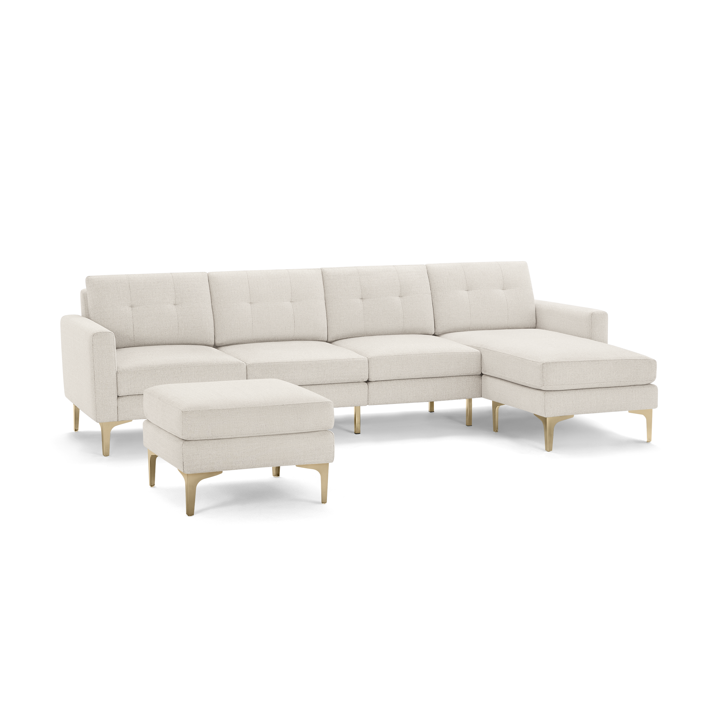 Cream-colored modern sectional sofa with tufted cushions, wooden legs, and matching ottoman on a black background.