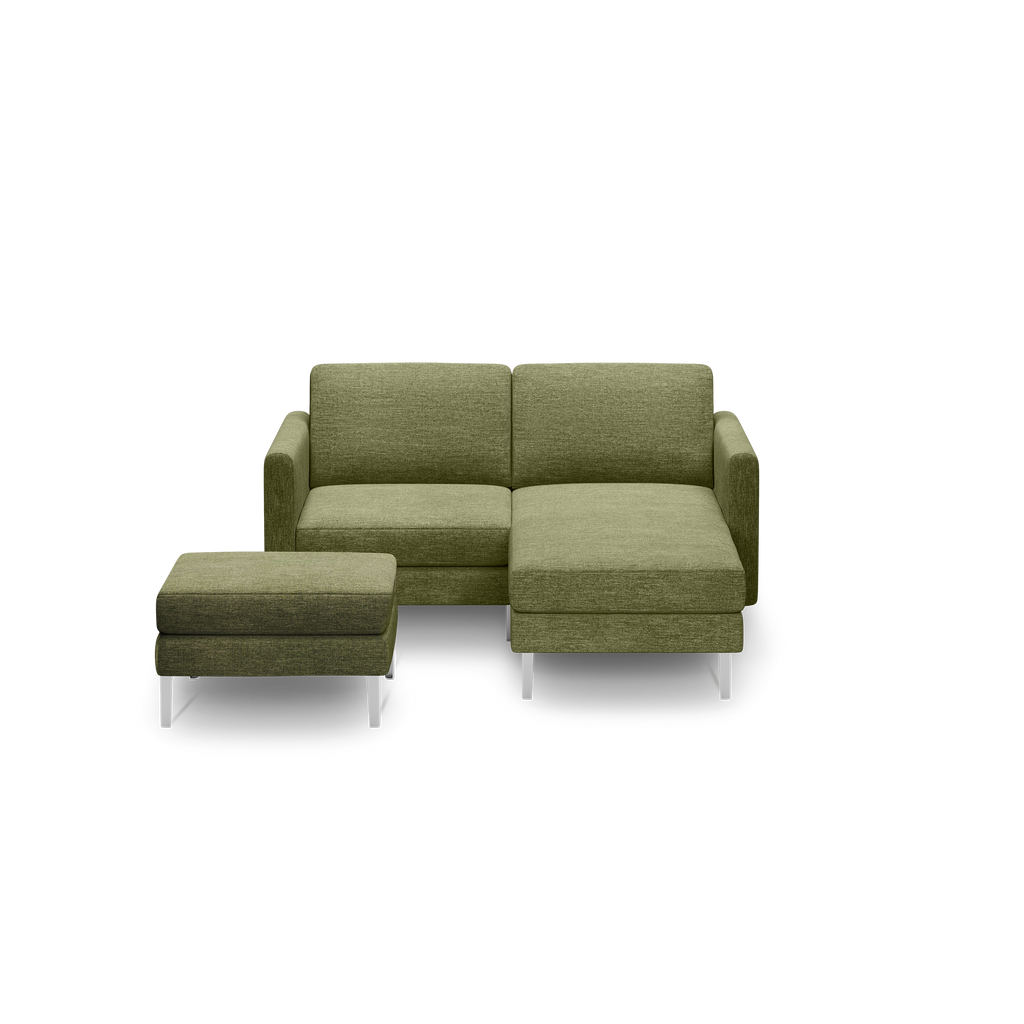 Olive green fabric sectional sofa with metal legs, featuring one armless ottoman and one chaise lounge.