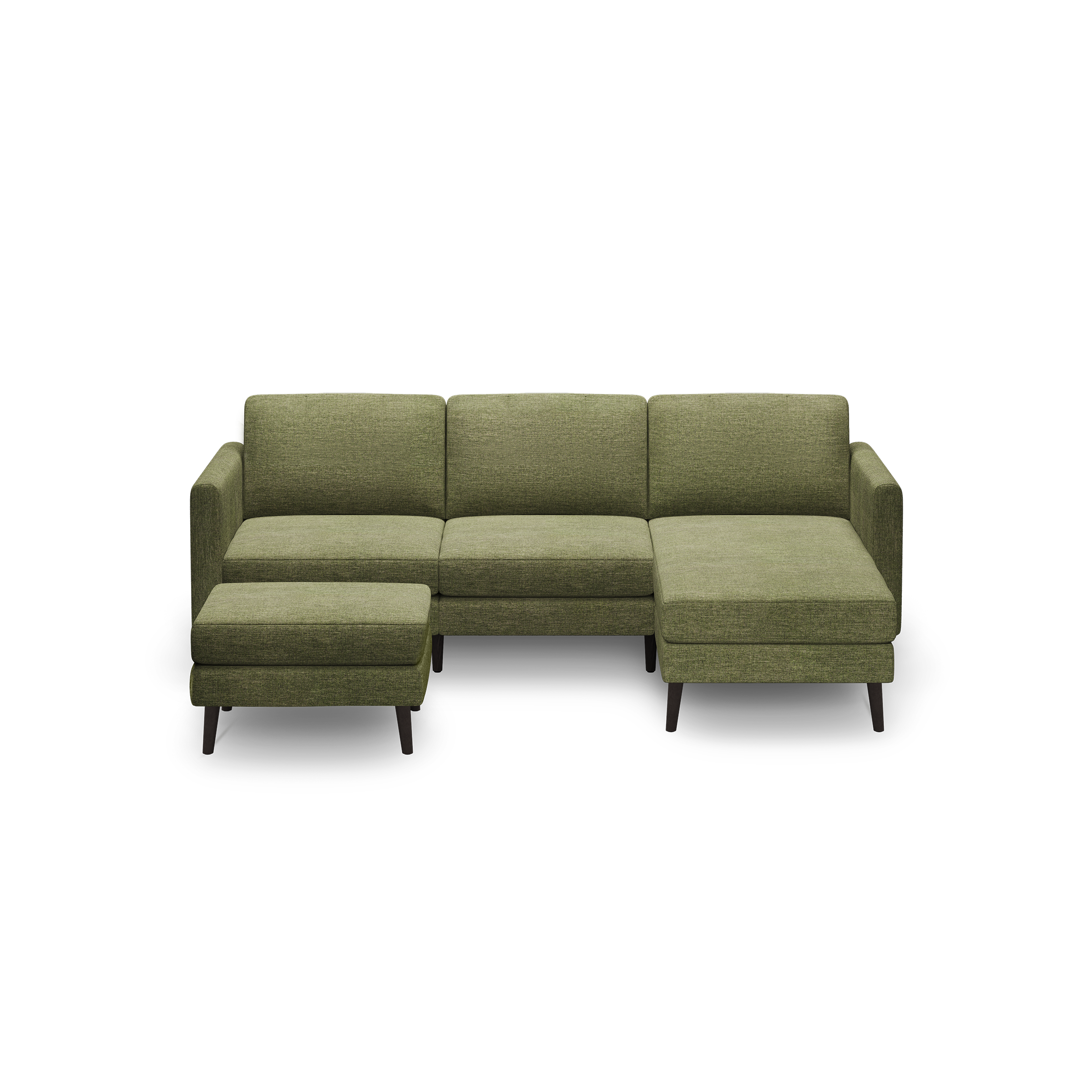 Green fabric L-shaped sectional sofa with chaise lounge and matching ottoman, featuring wooden legs.