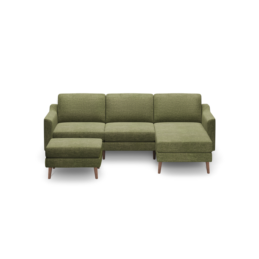 Green fabric sectional sofa with wooden legs, including a left-side ottoman and right-side chaise lounge.