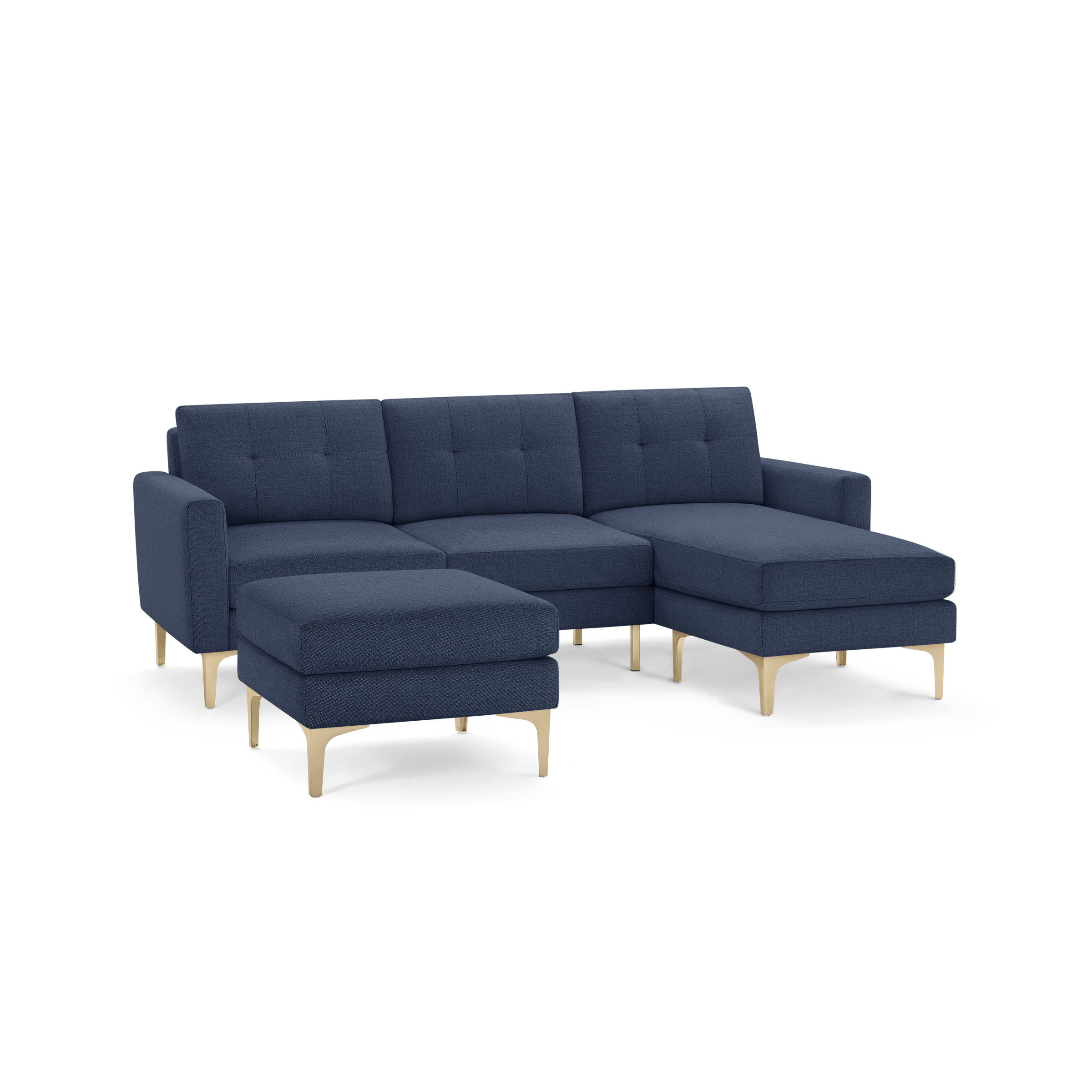Modern navy blue sectional sofa with tufted cushions, wooden legs, and matching ottoman.