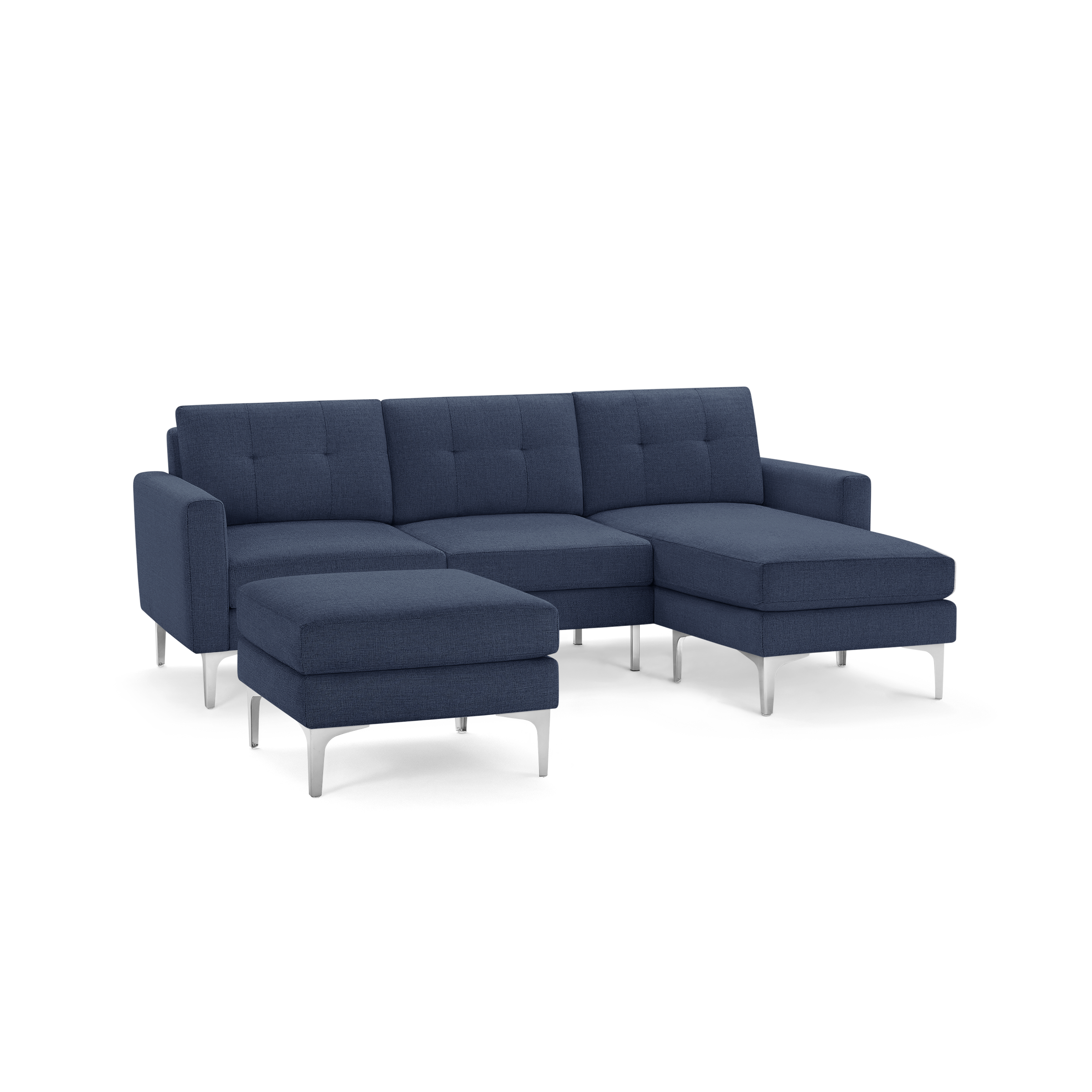 Modern navy blue fabric sectional sofa with tufted back cushions, metal legs, and separate ottoman.