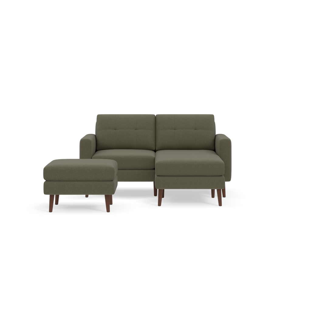 Modern Moss green fabric sectional sofa with wooden legs, featuring a chaise lounge and a matching ottoman.