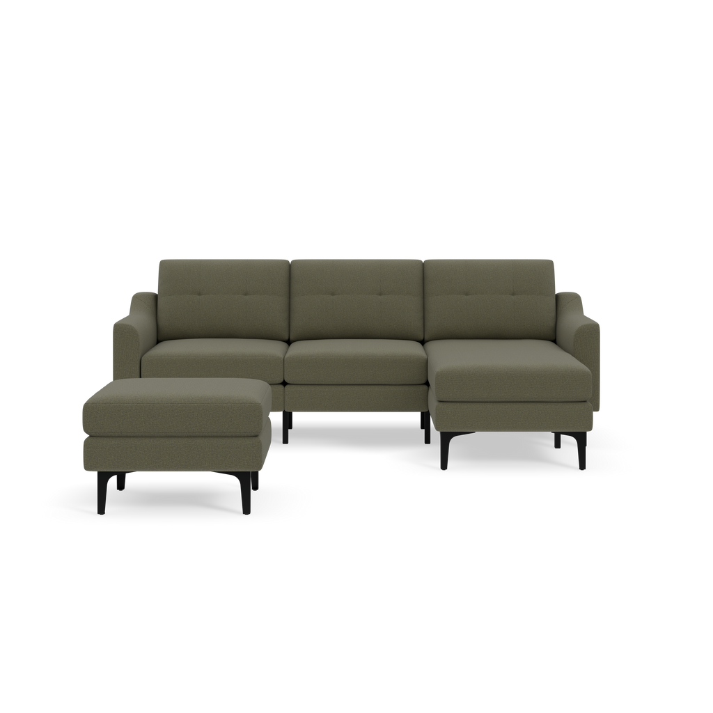 Modern Moss green L-shaped sectional sofa with tufted back cushions and black slender legs, featuring a matching ottoman.