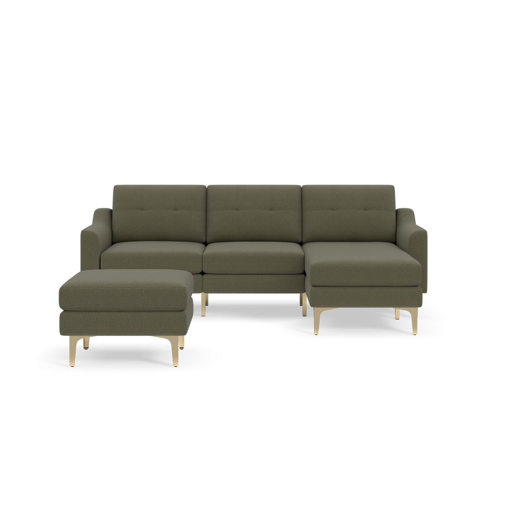 Modern Moss green sectional sofa with wooden legs and a matching ottoman on a black background.