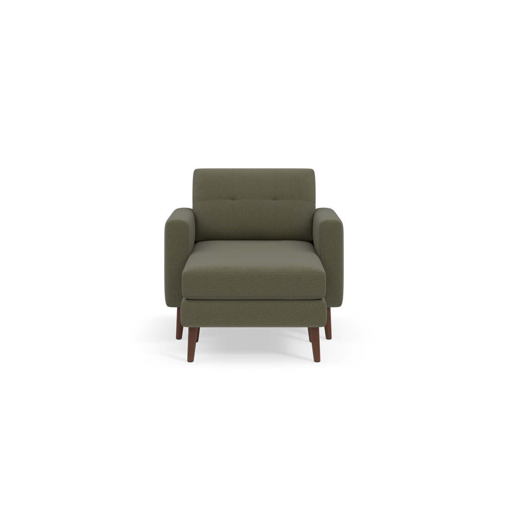 Modern Moss green armchair with padded seat, backrest, and armrests, supported by four tapered wooden legs.