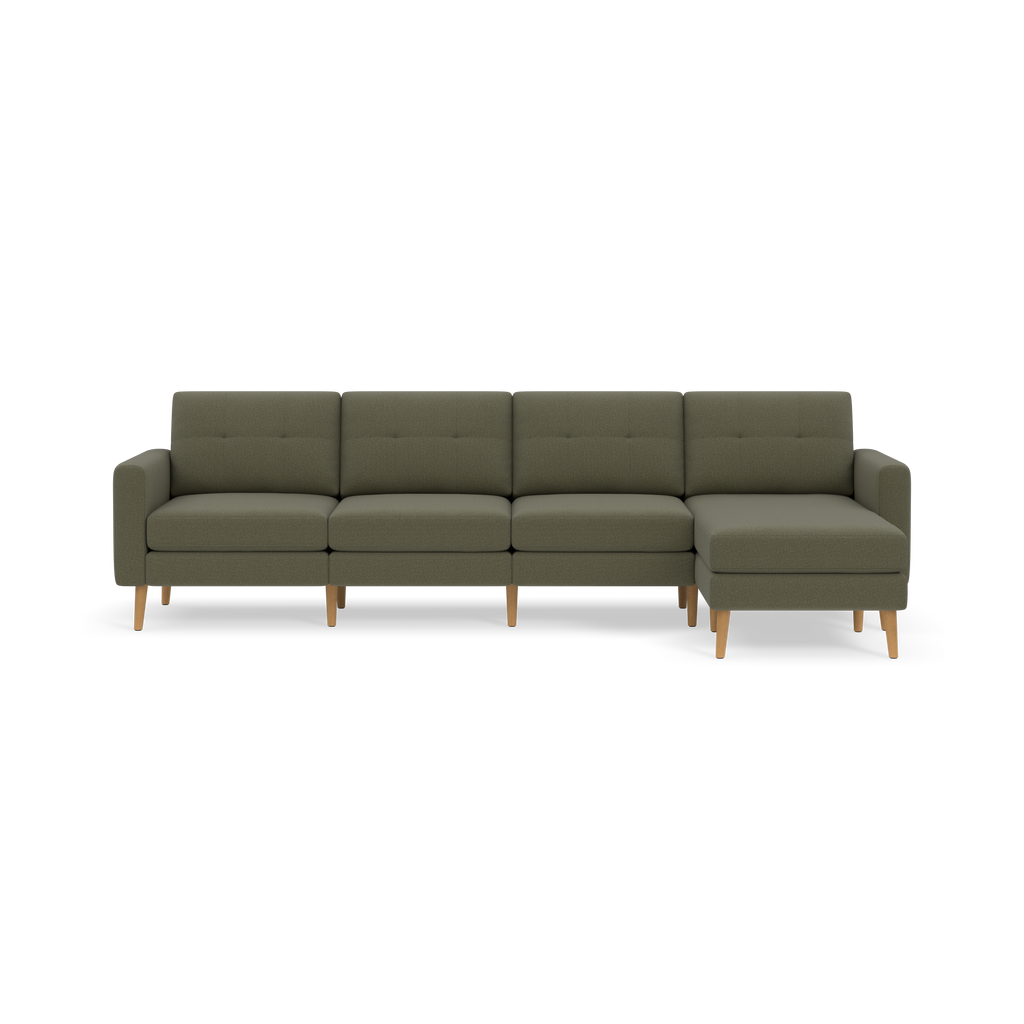 Large modern sectional sofa with Moss green fabric upholstery, tufted back cushions, wooden legs, and a right-hand chaise lounge.