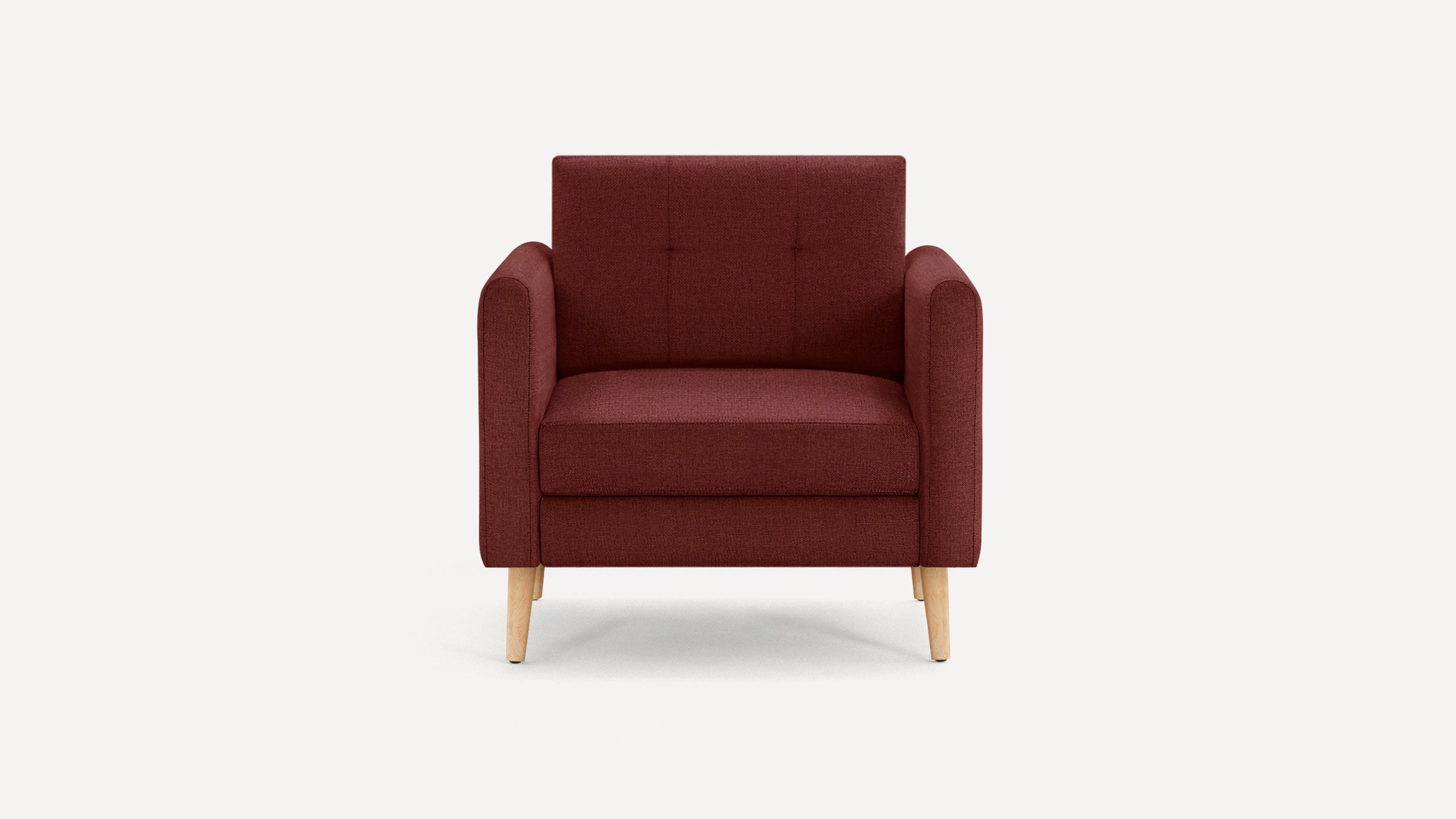 Front-facing maroon upholstered armchair with wooden legs and tufted backrest on plain white background.