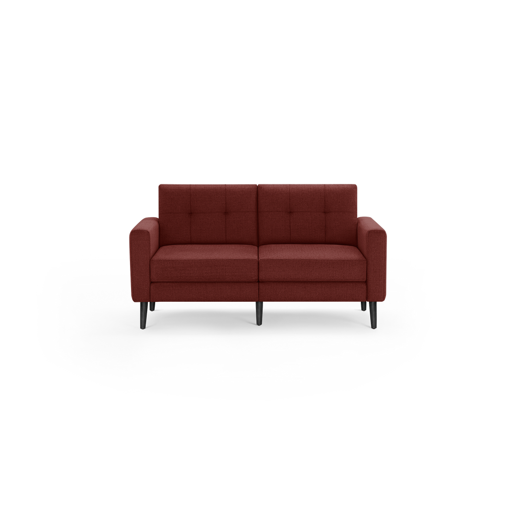 Two-seater sofa with dark red fabric upholstery, tufted back cushions, and black tapered wooden legs.