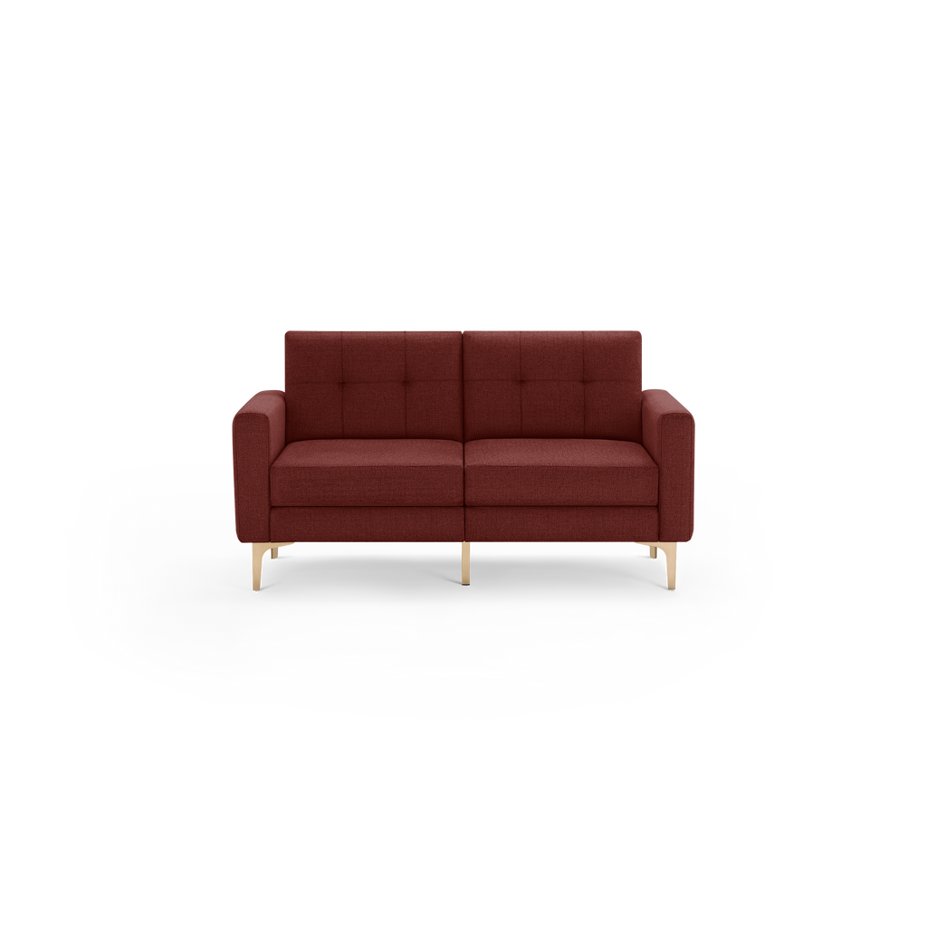 Modern two-seater sofa with reddish-brown fabric upholstery, tufted backrest, rectangular armrests, and light wooden legs.