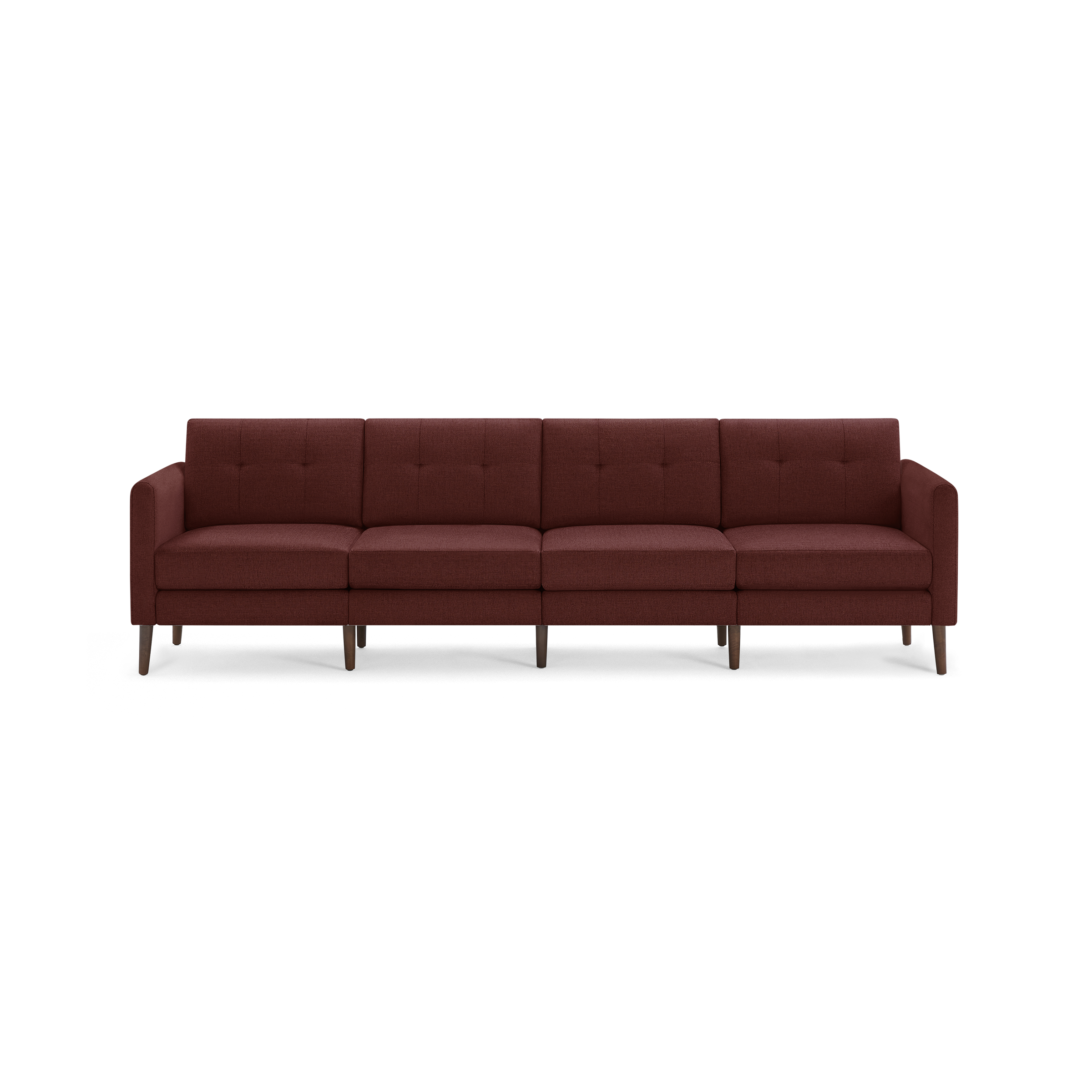 Modern, four-seater sofa upholstered in deep red fabric with tufted back cushions and wooden tapered legs.