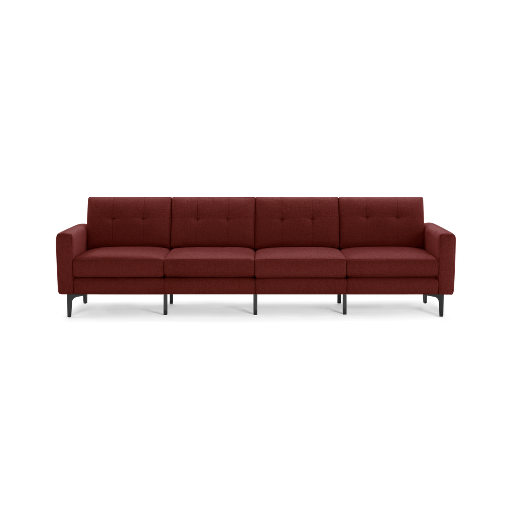 Modern four-seater sofa in deep red fabric with button-tufted back cushions and black metal legs, featuring clean lines and square armrests.