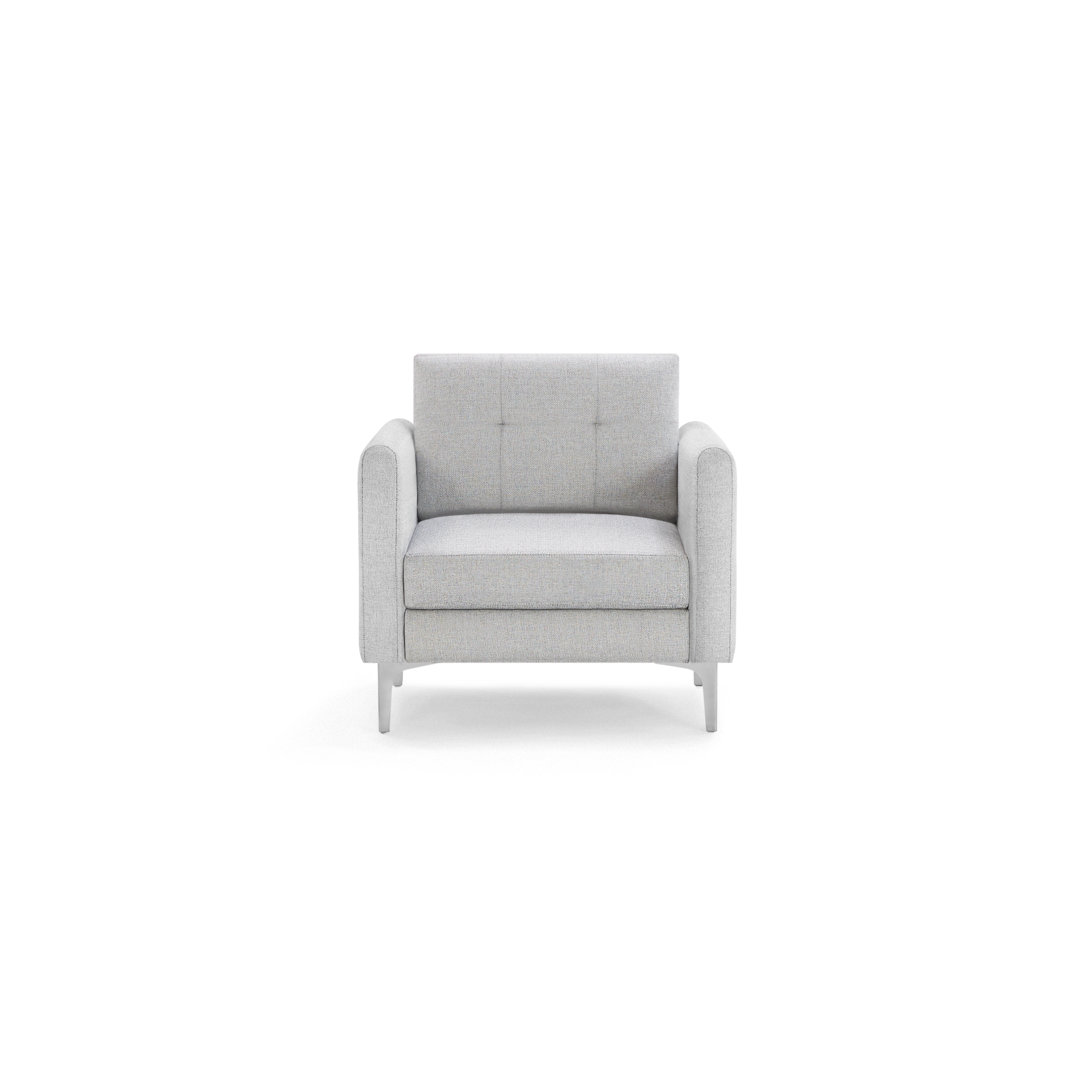 Modern single-seat armchair with light gray fabric upholstery, square backrest with subtle tufting, padded arms, and sleek metal legs.
