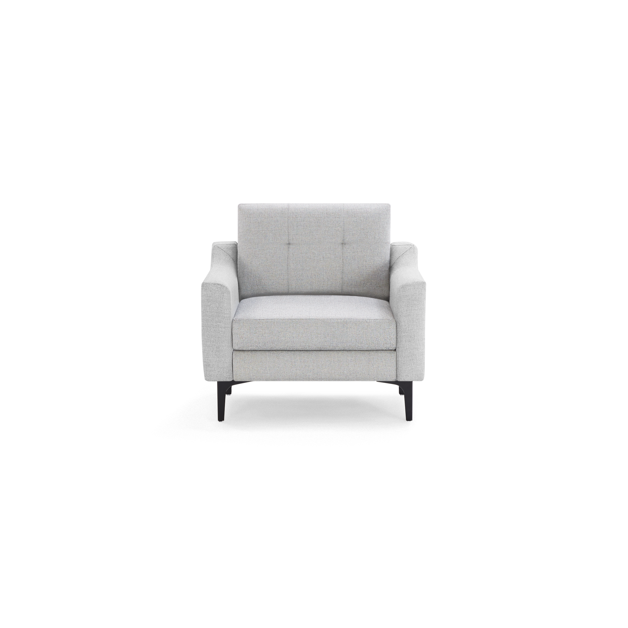 Light gray modern armchair with cushioned seat, button tufted backrest, wide armrests, and black metal legs.
