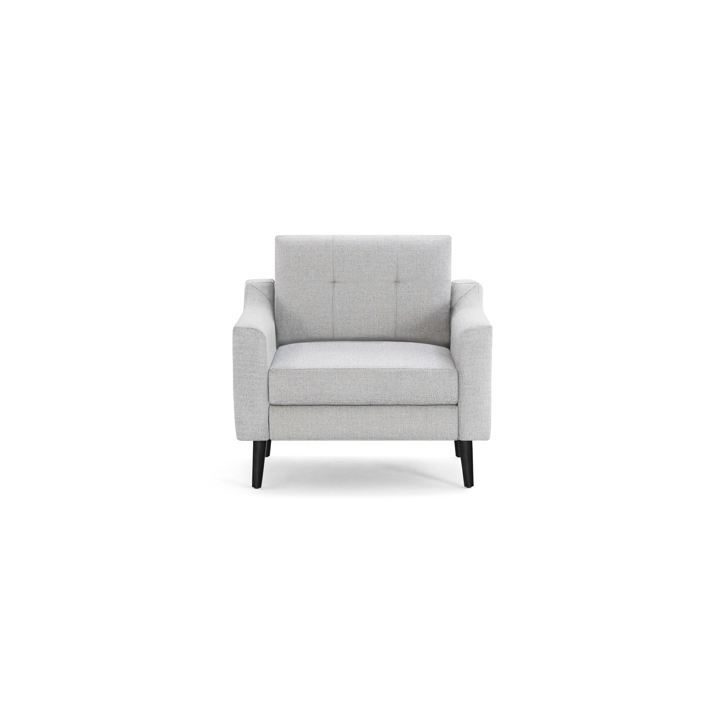 Light gray upholstered armchair with a tufted backrest, cushioned seat, and black wooden legs, shown from the front.