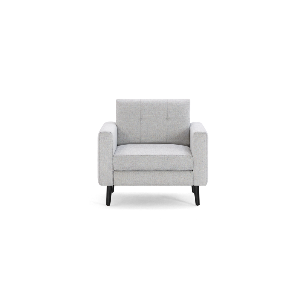 Light gray fabric armchair with clean lines, square arms, tufted backrest, and black tapered wooden legs.