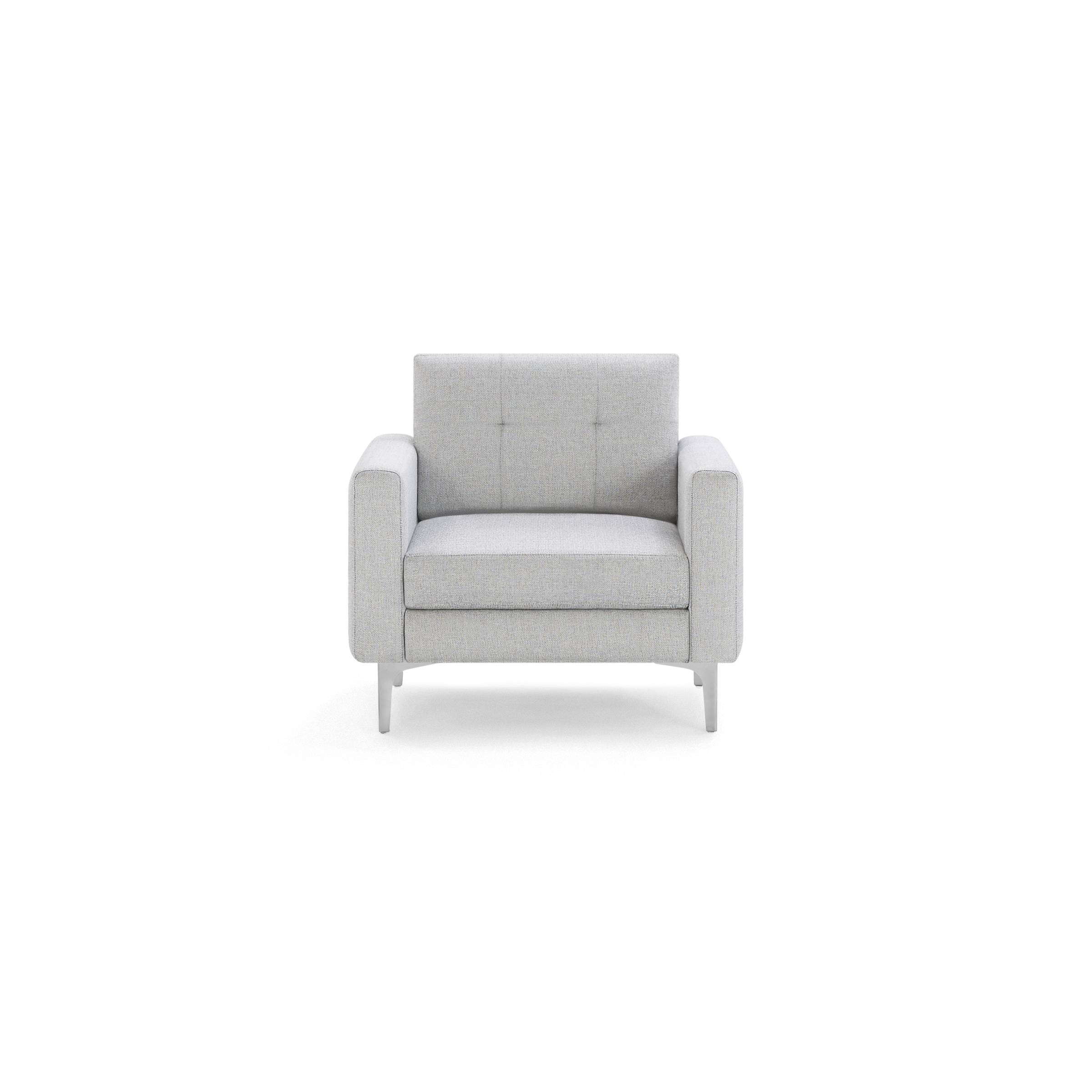 Light grey fabric armchair with square arms, tufted backrest, thick seat cushion, and slim metal legs.