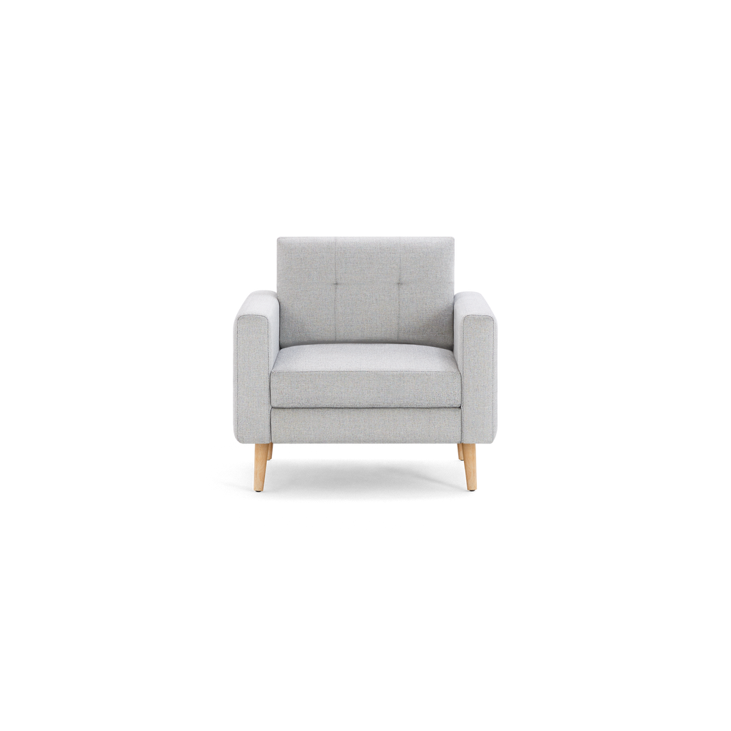 Light gray upholstered armchair with tufted backrest, square arms, and natural wood legs, shown on white background.