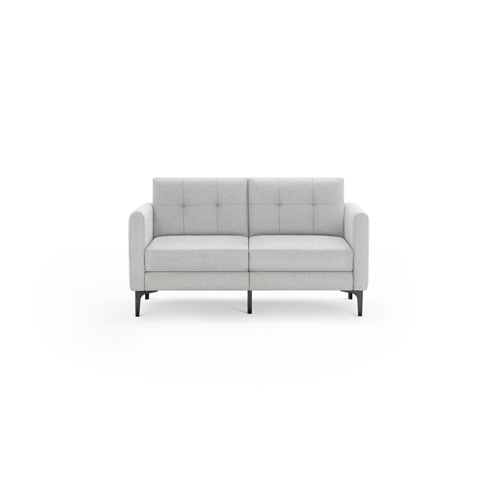Light gray two-seat sofa with tufted back cushions, straight arms, and black metal legs on a transparent background.