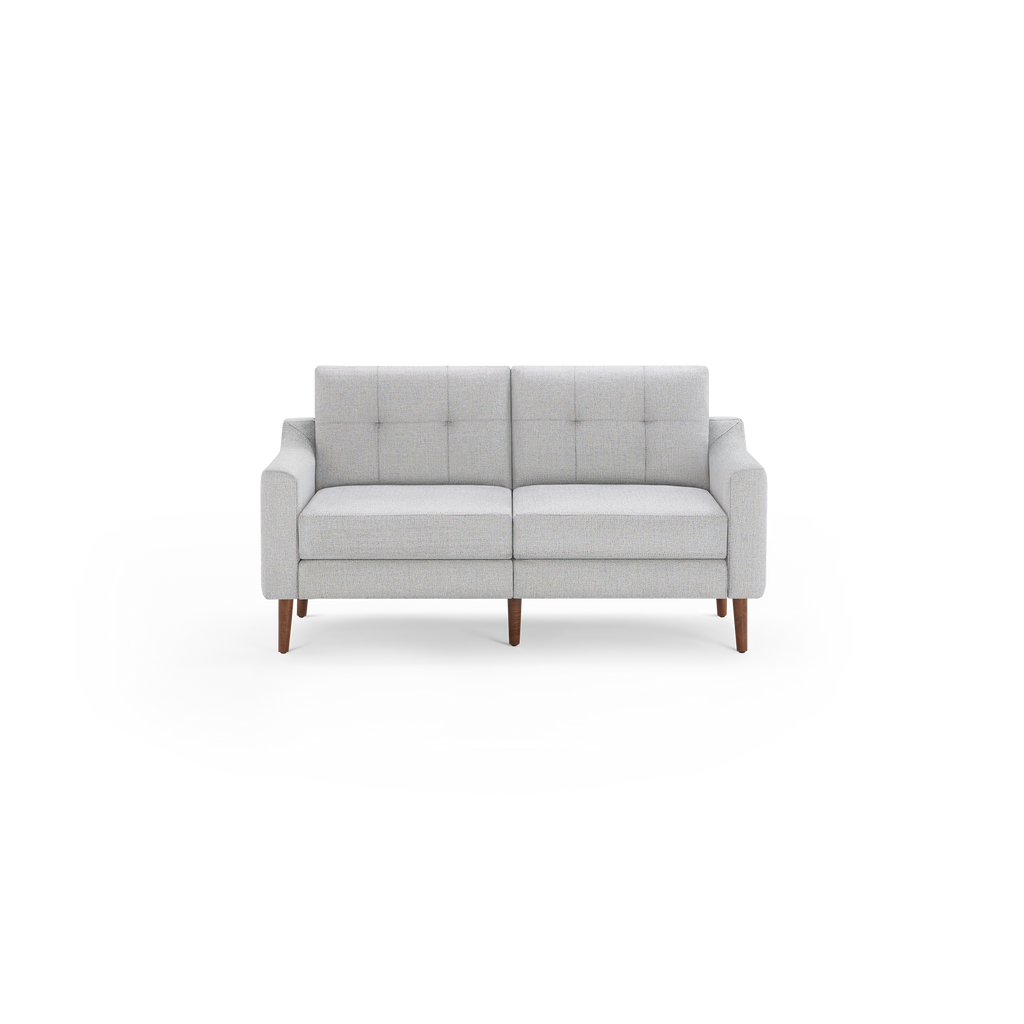 Light gray, modern two-seater sofa with tufted back cushions, straight armrests, and wooden tapered legs.