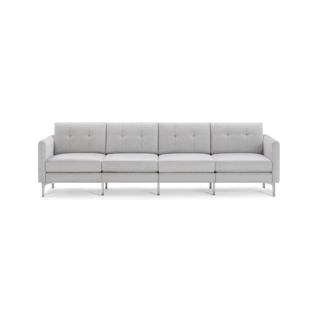 Modern light gray fabric sofa with four seat cushions, tufted backrest, slim armrests, and metal legs, designed for spacious seating.