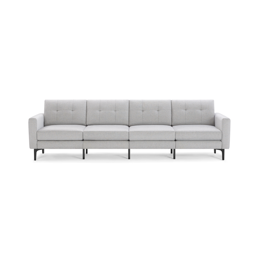 Light gray modern four-seat sofa with tufted backrests, straight armrests, and black metal legs.