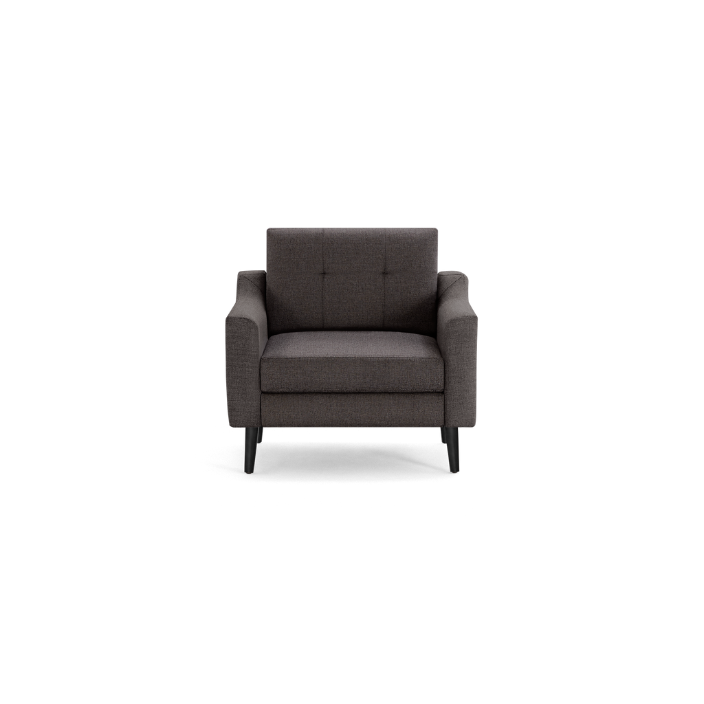 Modern dark gray fabric armchair with button-tufted backrest, cushioned seat, and angled black wooden legs.
