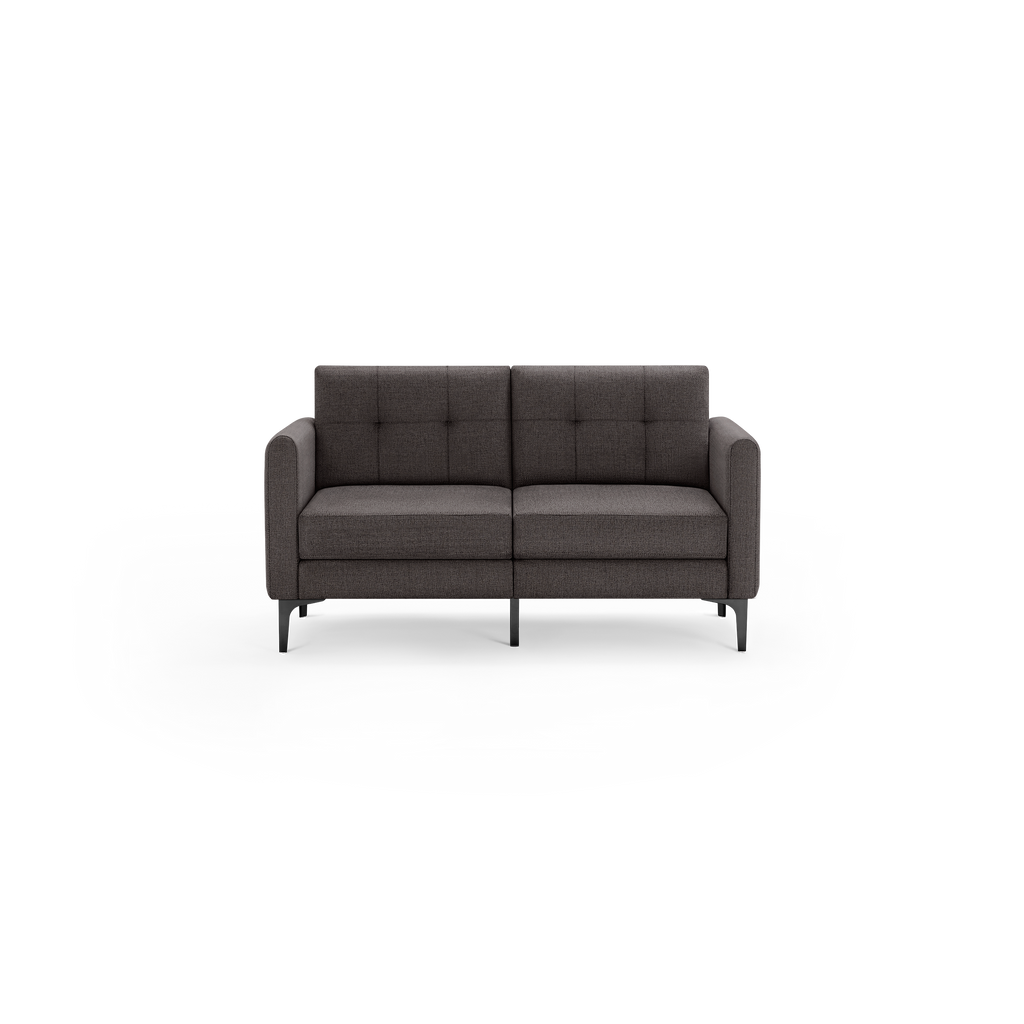 Dark gray modern upholstered two-seater sofa with tufted backrest and thin black metal legs, straight armrests, and a minimalist design.