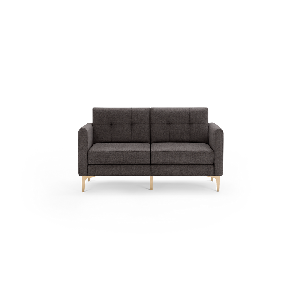 Dark gray modern two-seater sofa with button-tufted backrest, cushioned seats, rounded armrests, and slim gold metal legs.