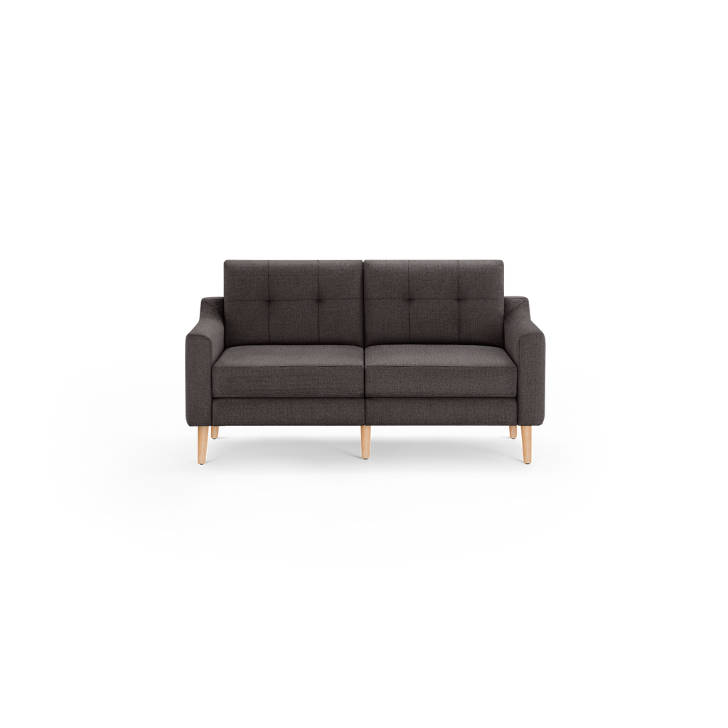 Dark gray mid-century modern fabric sofa with tufted backrest and light wooden legs, designed for two seating spaces.