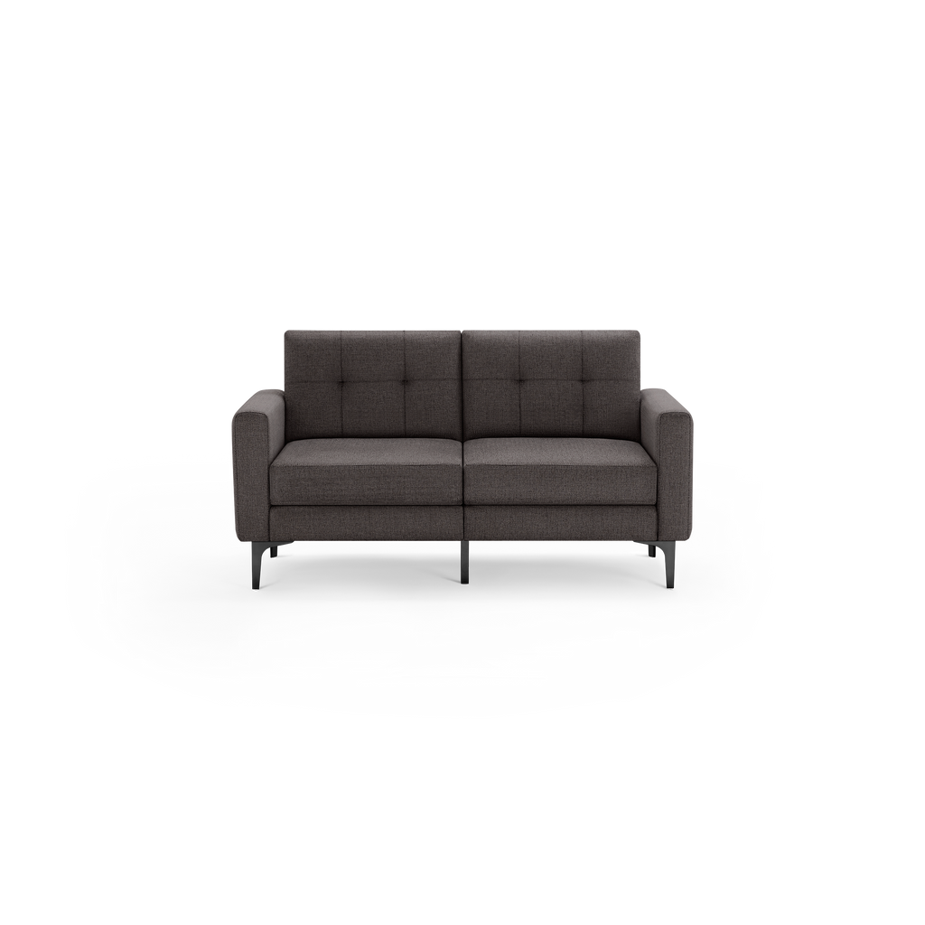 Modern dark gray fabric loveseat with tufted backrest, straight arms, and slim black metal legs on a transparent background.