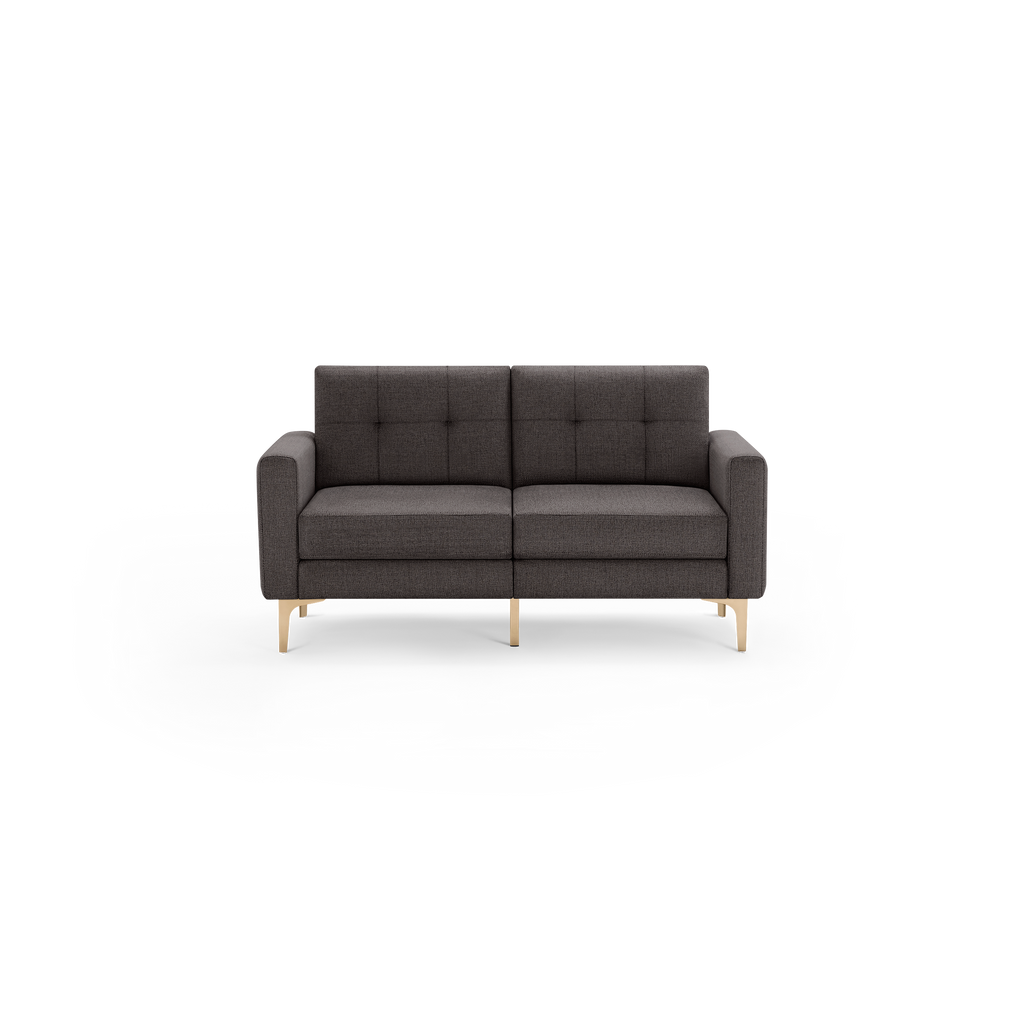 Modern dark gray fabric loveseat with tufted backrest, square armrests, and sleek gold metal legs.