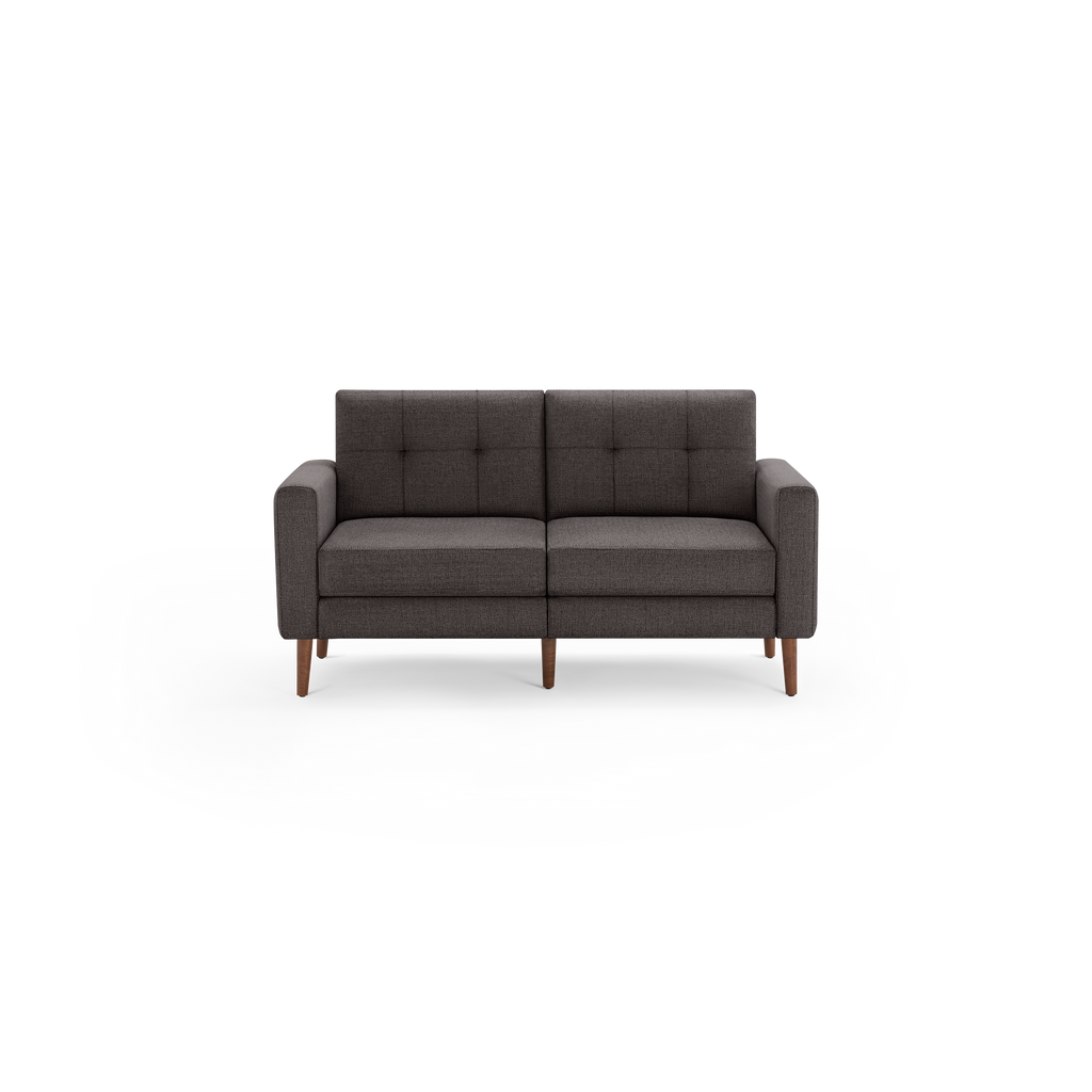 Dark gray two-seater fabric sofa with tufted back cushions and wooden legs, featuring straight armrests.
