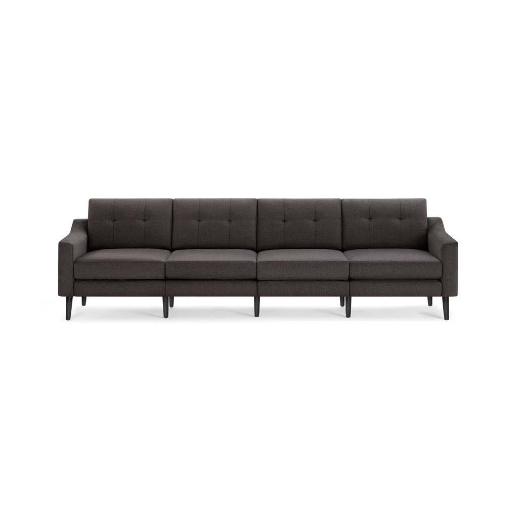 Dark gray modern fabric sofa with four seat cushions, button-tufted backrests, slim armrests, and black tapered wooden legs.