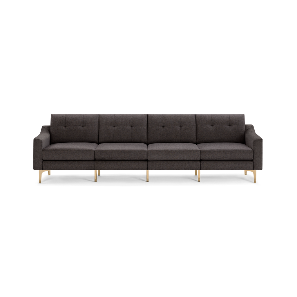Modern dark gray fabric sofa with clean lines, tufted back cushions, and sleek gold metal legs, seating four people.